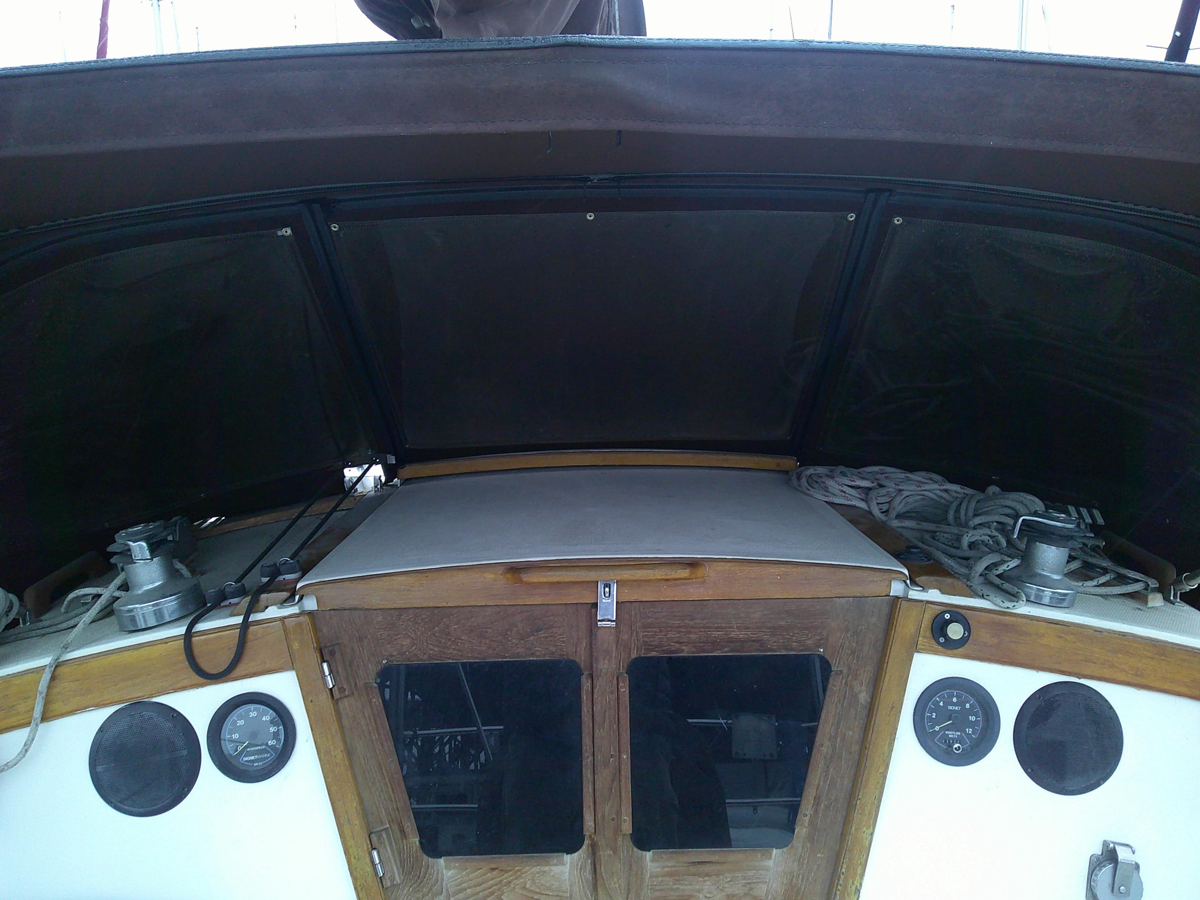 1984 Catalina 36' sloop cockpit with wooden hatch and navigation instruments.