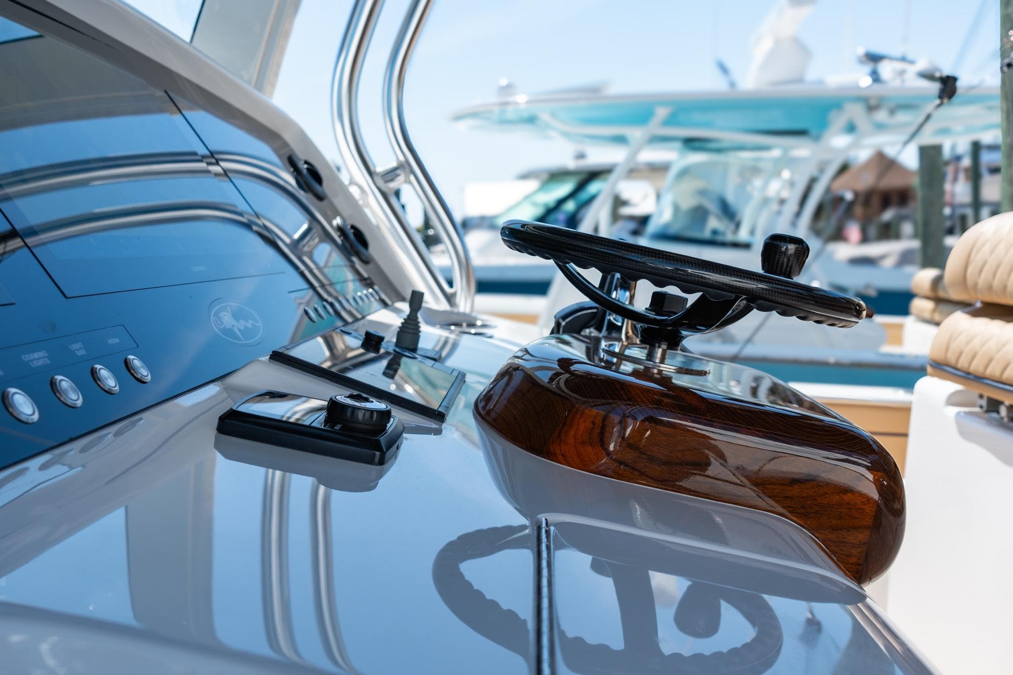 2023 Valhalla Boatworks V-46 helm with modern controls and sleek design.
