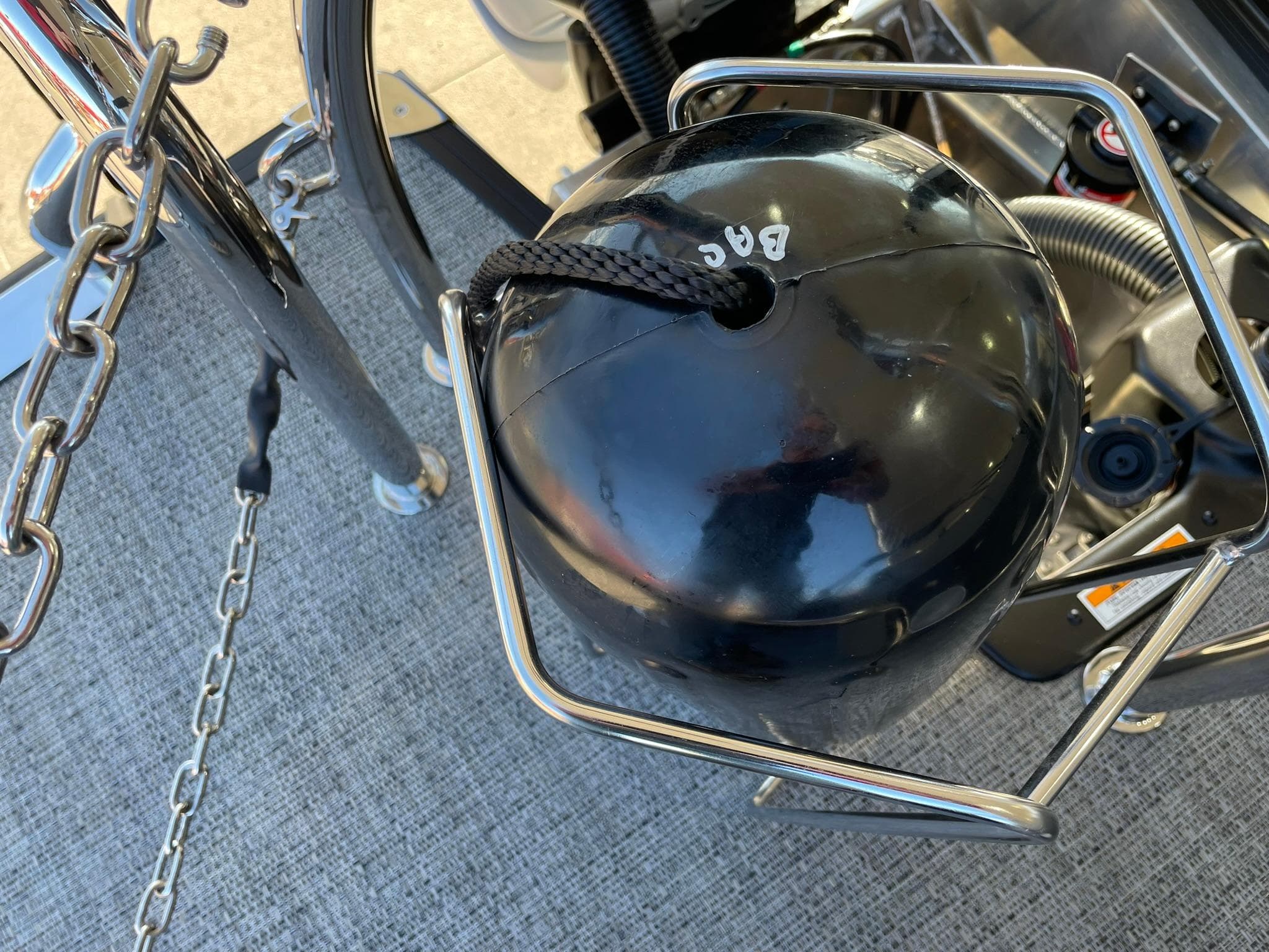 Barletta CORSA 23UCA 2024 boat with black fender and chain on deck.