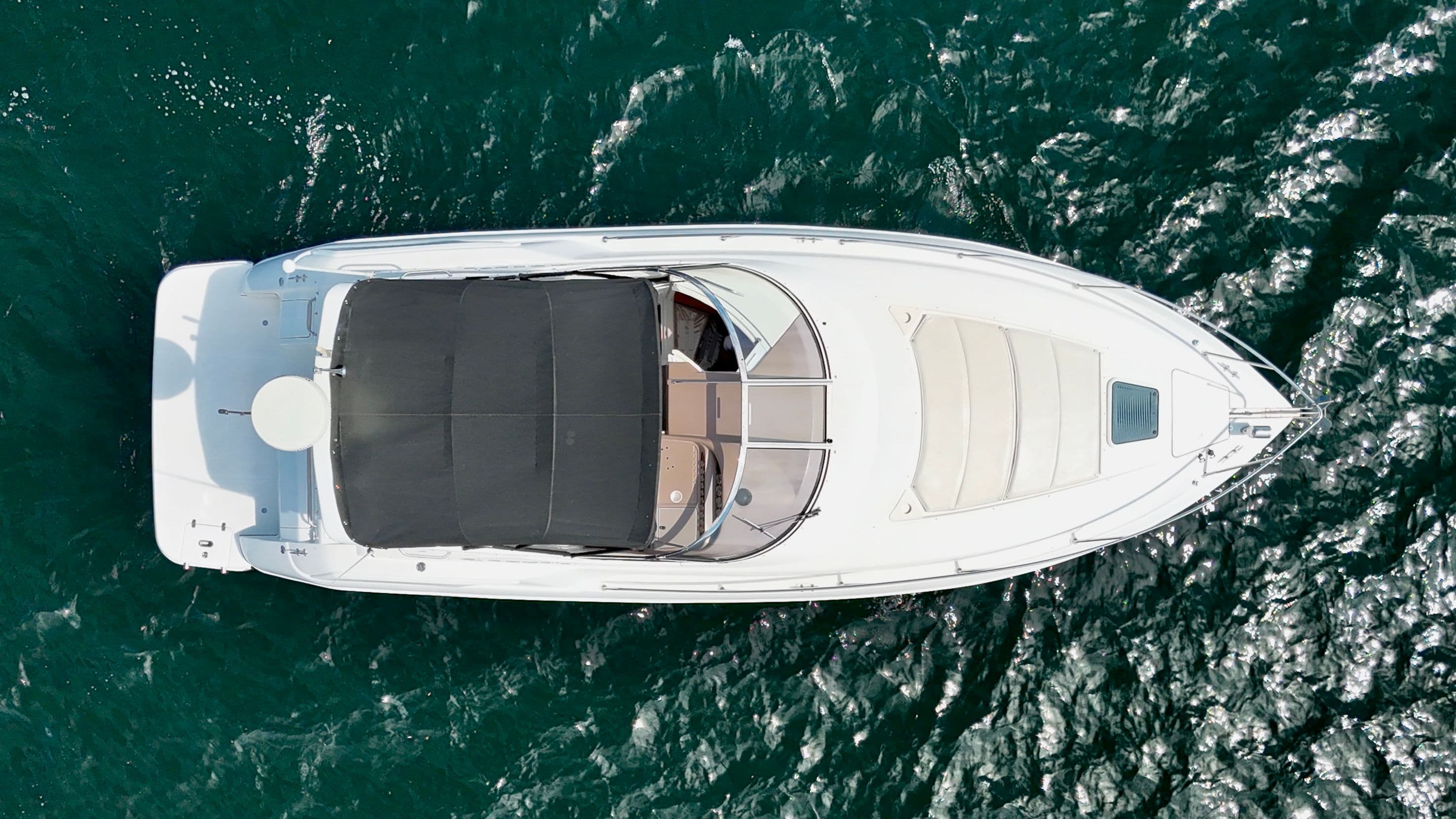 Aerial view of a 2004 Regal Commodore 3260 yacht on the water.