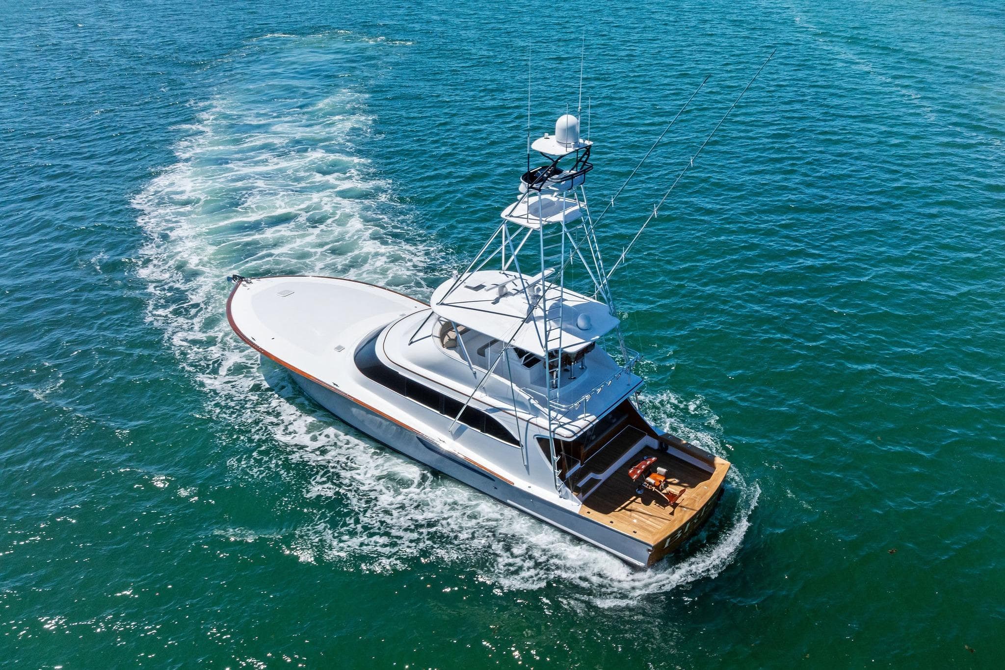 2017 Weaver Custom Sportfish yacht cruising on clear blue ocean waters.