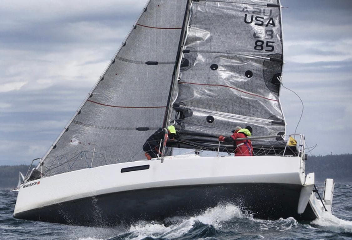 Sailing yacht Seascape 27 navigating choppy waters, 2018 model.