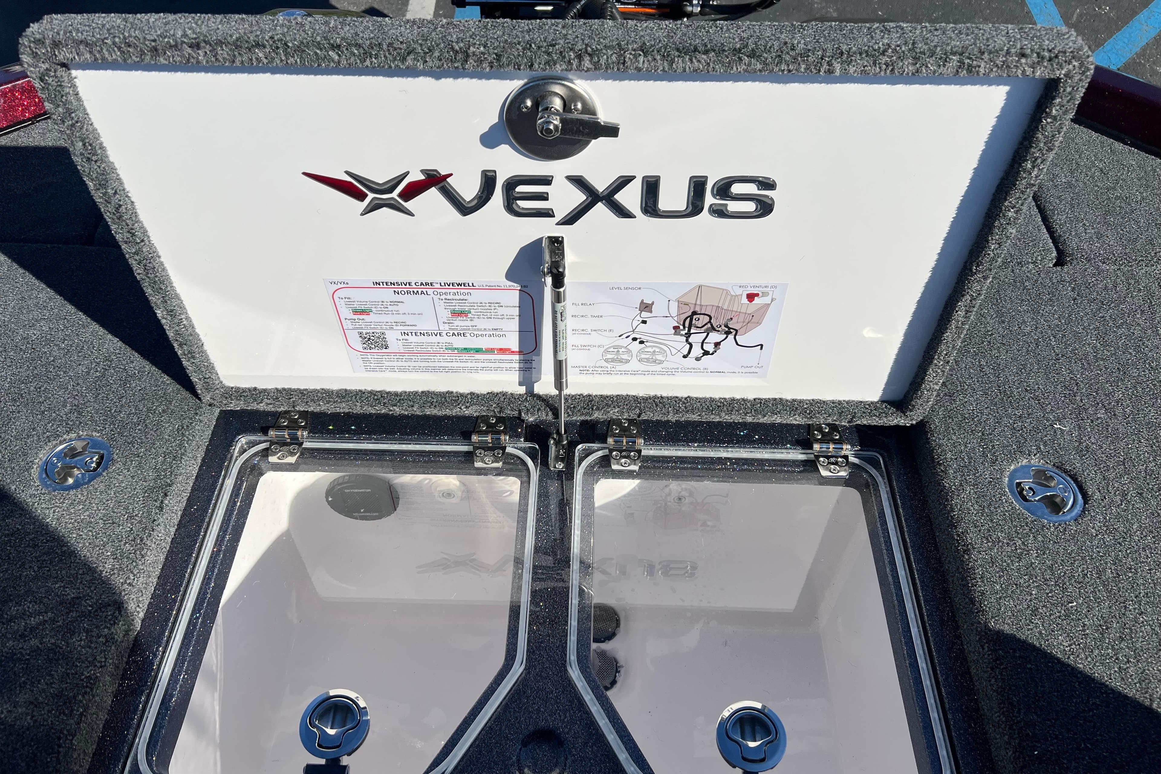 2026 Vexus VXS20 boat livewell compartment with logo and operation instructions.