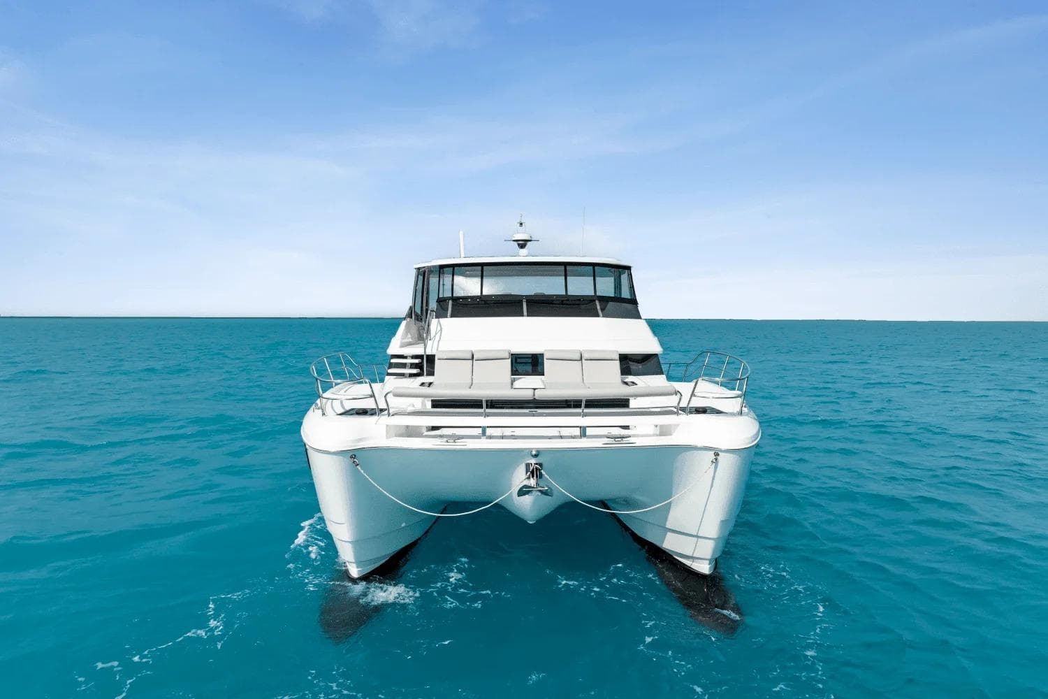 Aquila 50 Yacht 2026 cruising on clear blue ocean waters.