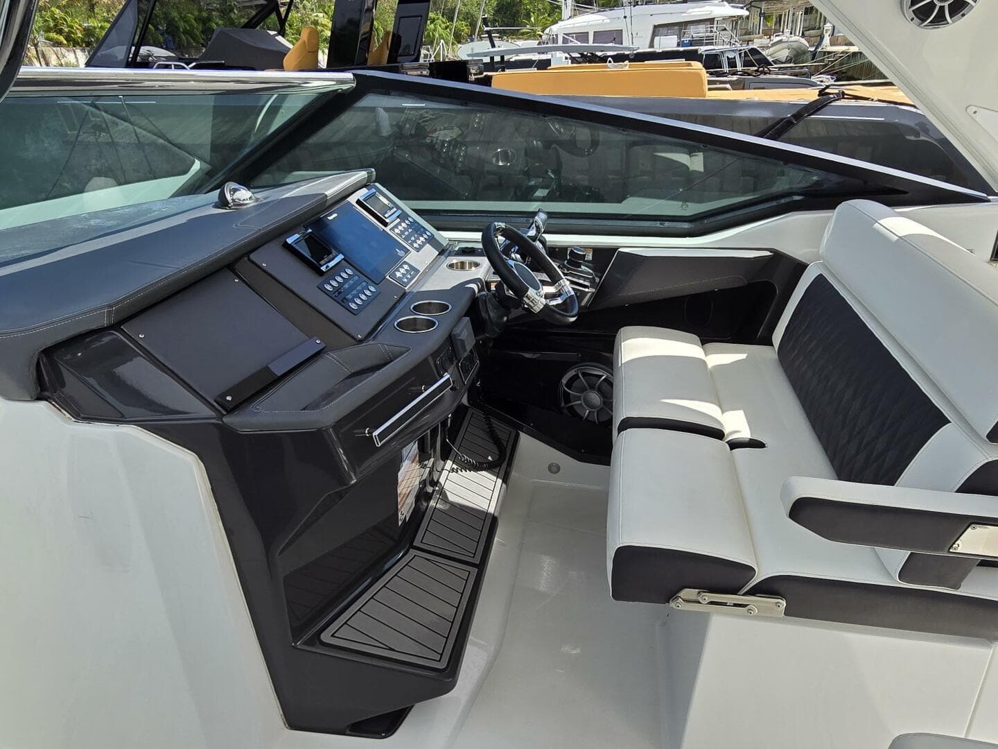 2018 Monterey 378 SE boat interior with modern dashboard and seating.
