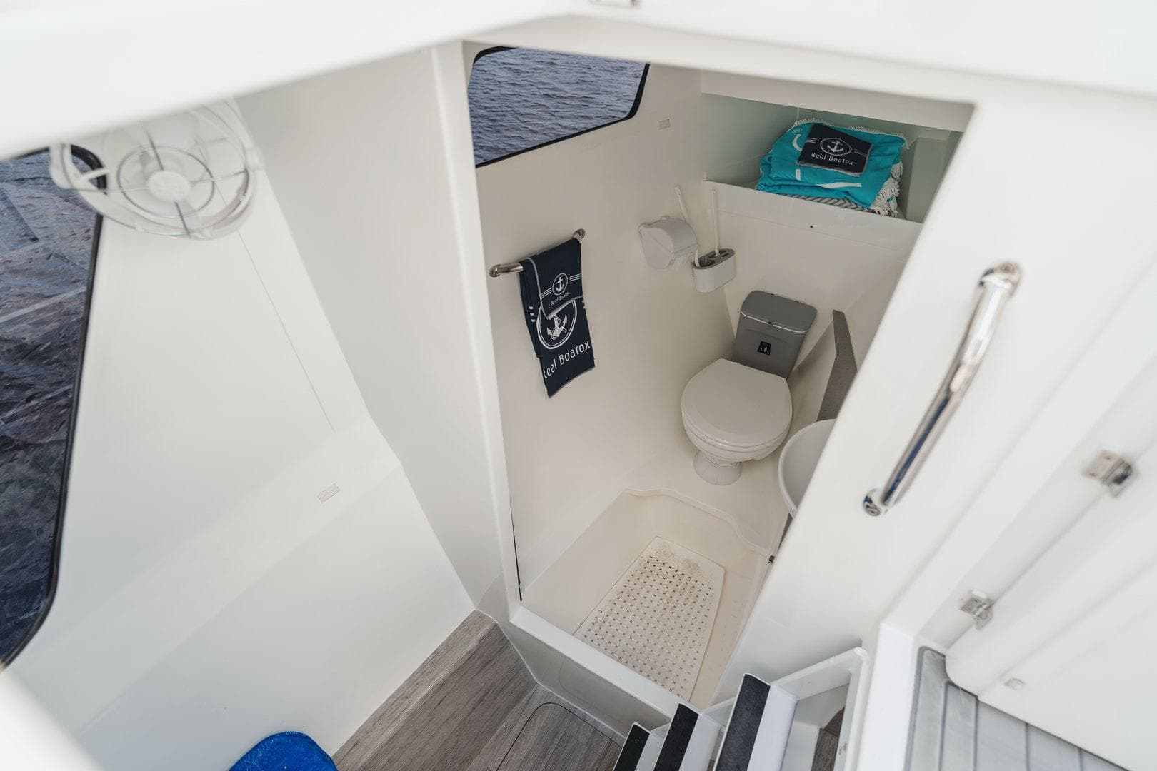 2024 YachtCat 41 interior bathroom with modern amenities and nautical decor.