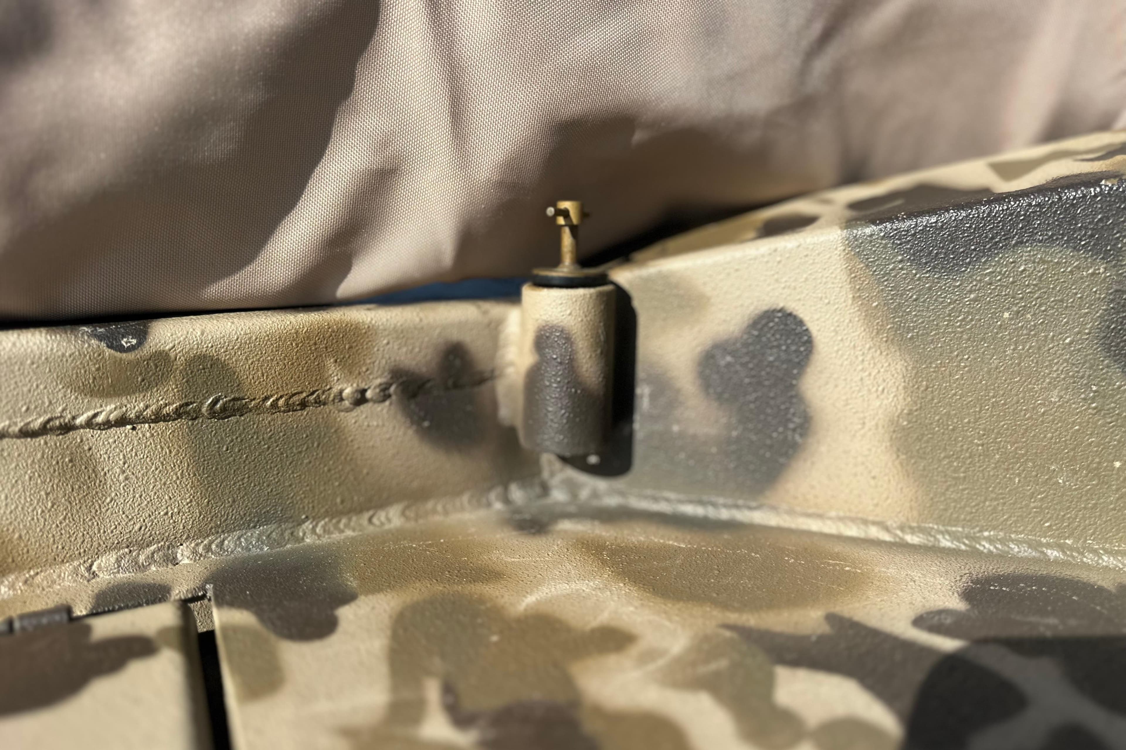 Close-up of 2026 Excel 1751 Viper F4 camo-patterned surface detail.