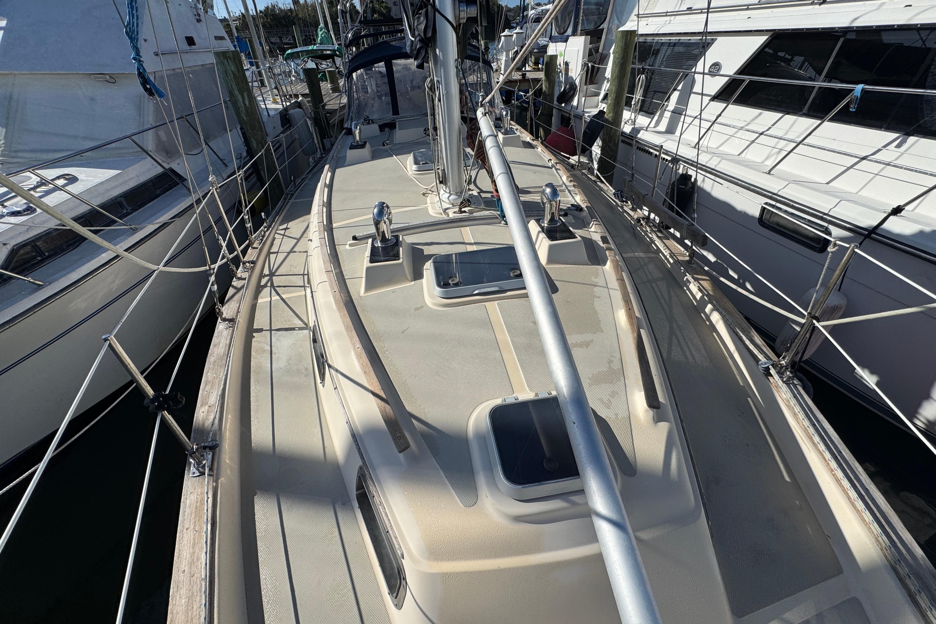 1991 Island Packet Yachts 38 sailboat docked, showcasing deck and rigging details.