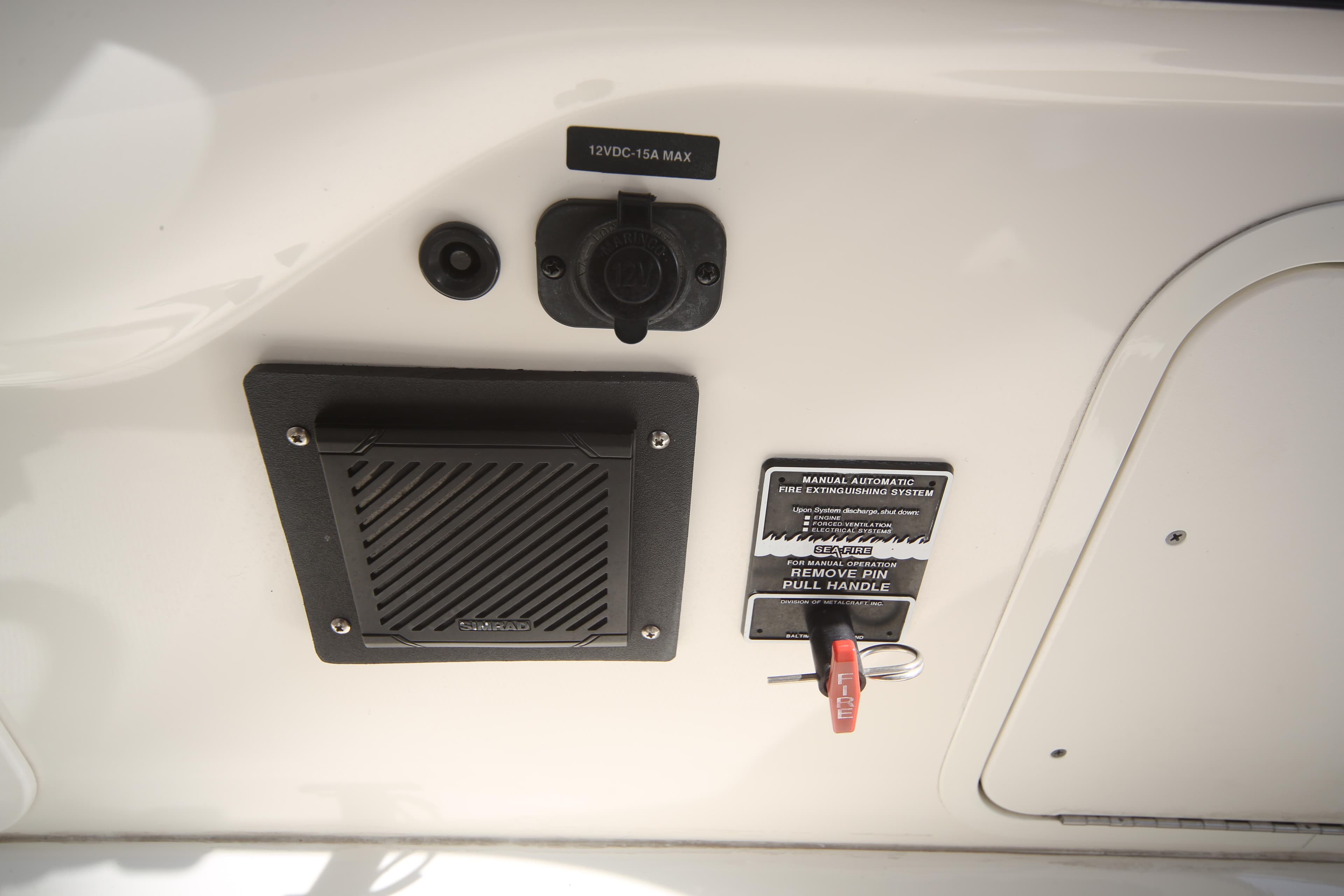 2007 Sea Ray 44 Sedan Bridge control panel with switches and speaker.