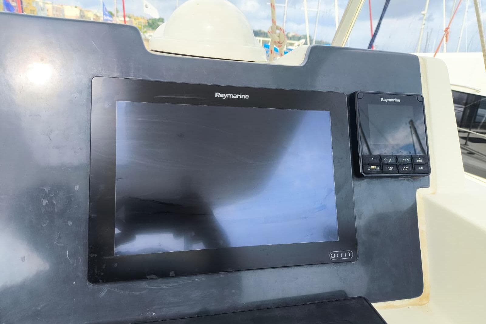 Raymarine navigation system on 2021 Leopard 42 yacht, featuring dual screens and control panel.