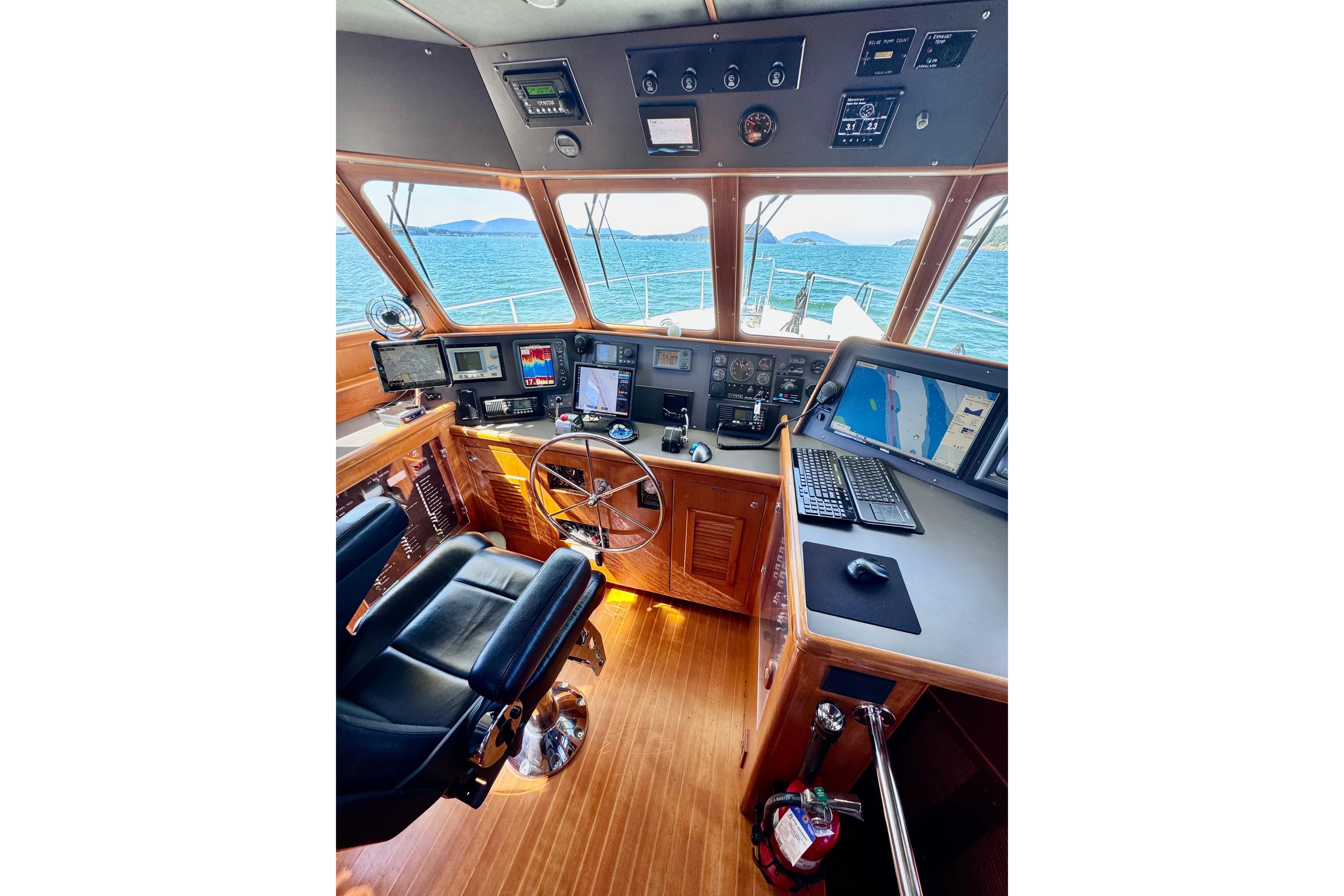 Pilothouse of 2000 Nordhavn 50 yacht with navigation equipment and ocean view.