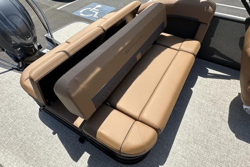 2026 Bennington M Swingback 22 MSB boat with tan seating and modern design.