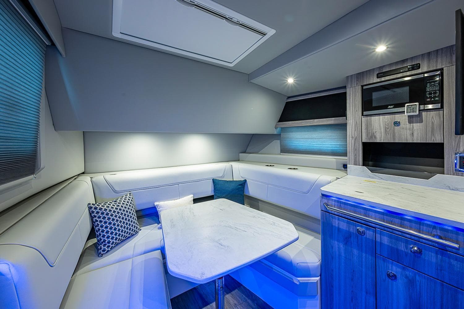 Luxurious interior of 2024 Formula 400 Super Sport Crossover with modern seating and ambient lighting.