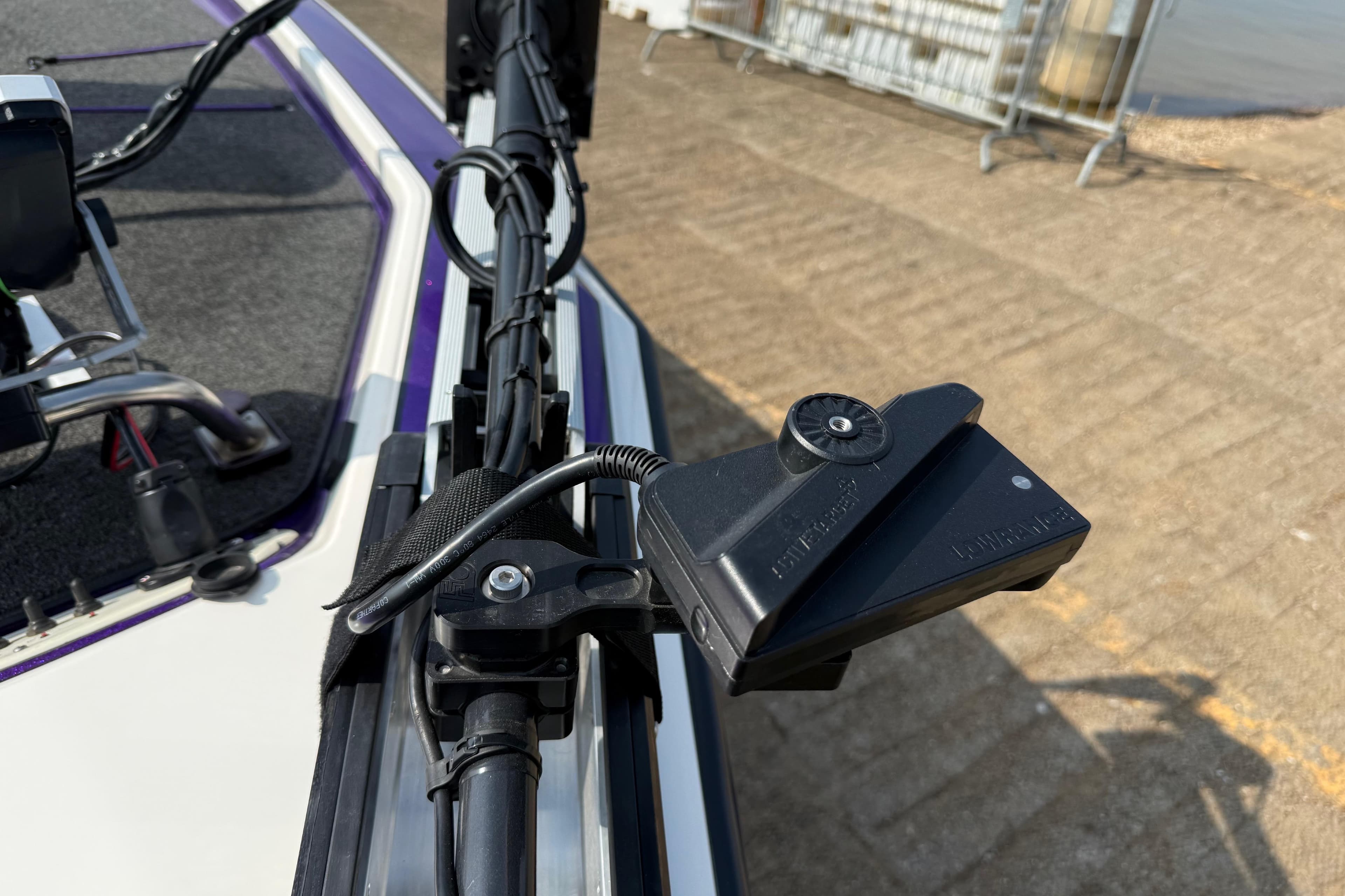 Close-up of a 2002 Bullet 21XDC boat's trolling motor mount and wiring.