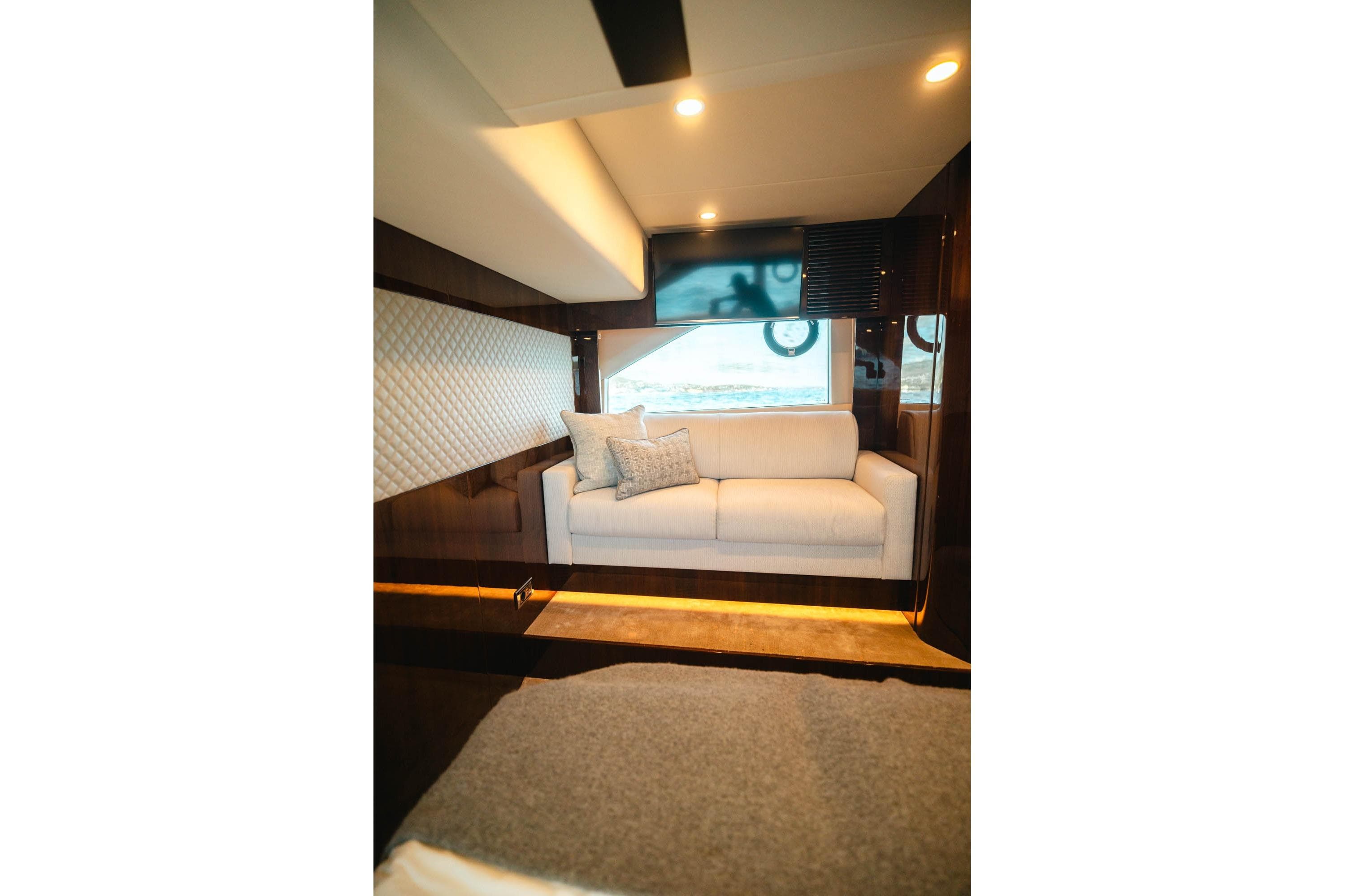 Luxurious interior of 2020 Fairline Targa 45 Open yacht with elegant seating.