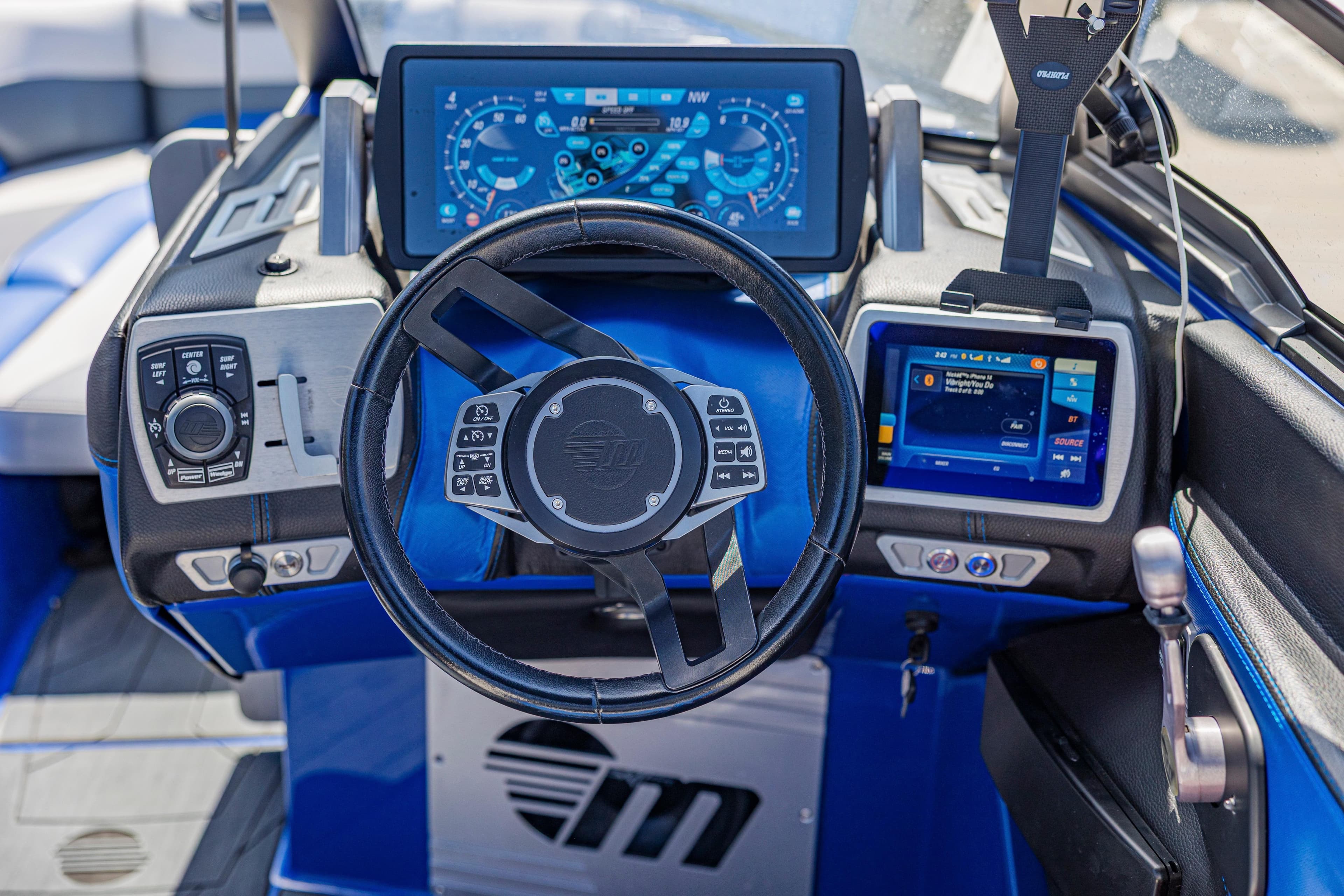 2017 Malibu M235 boat dashboard with advanced controls and digital displays.