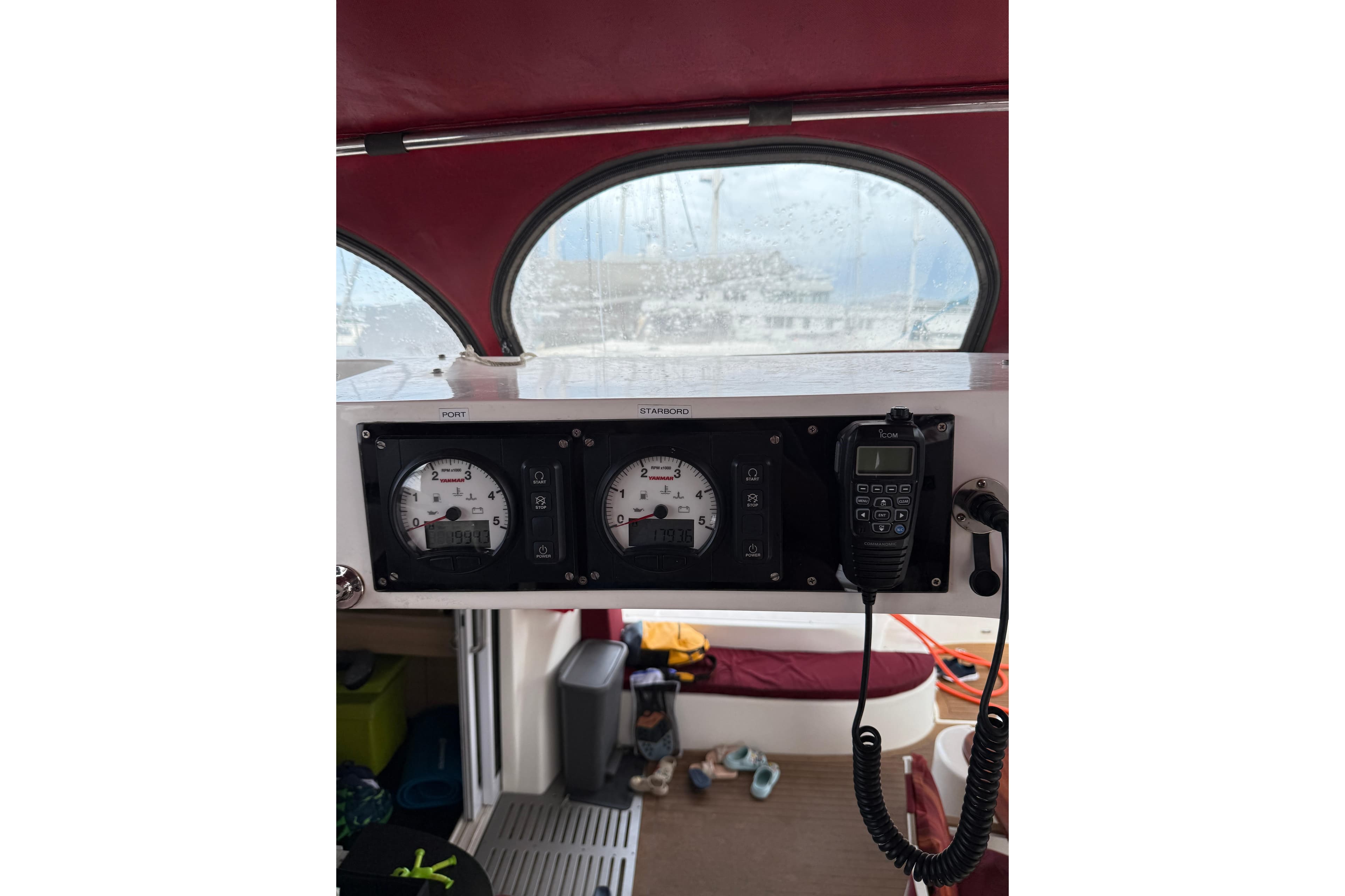 Control panel of a 2012 Dean 5000 boat with gauges and radio.