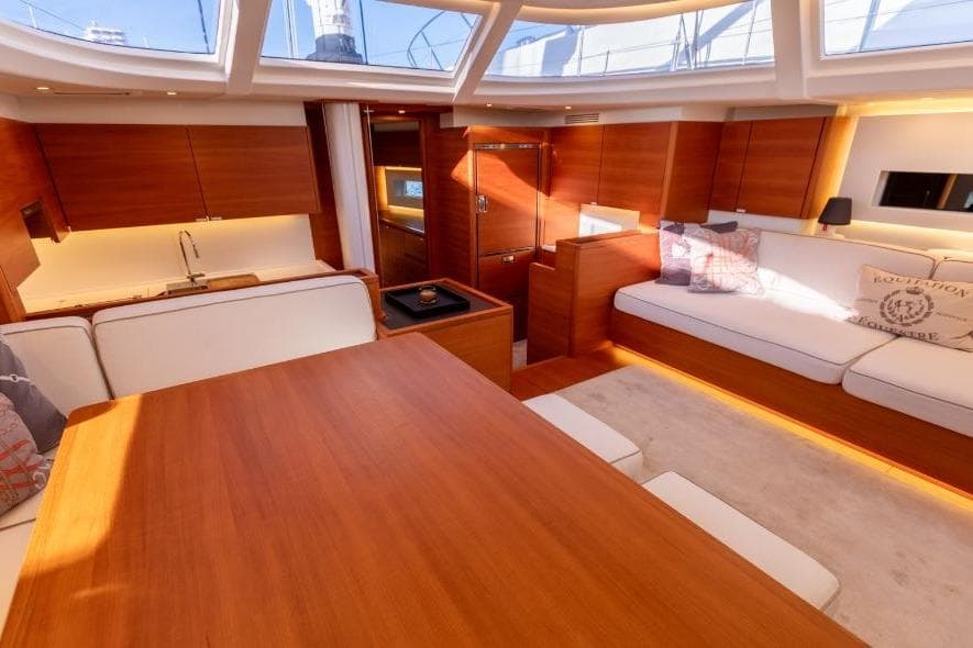 Luxurious interior of 2022 Solaris 64RS yacht with elegant wood finishes and modern design.