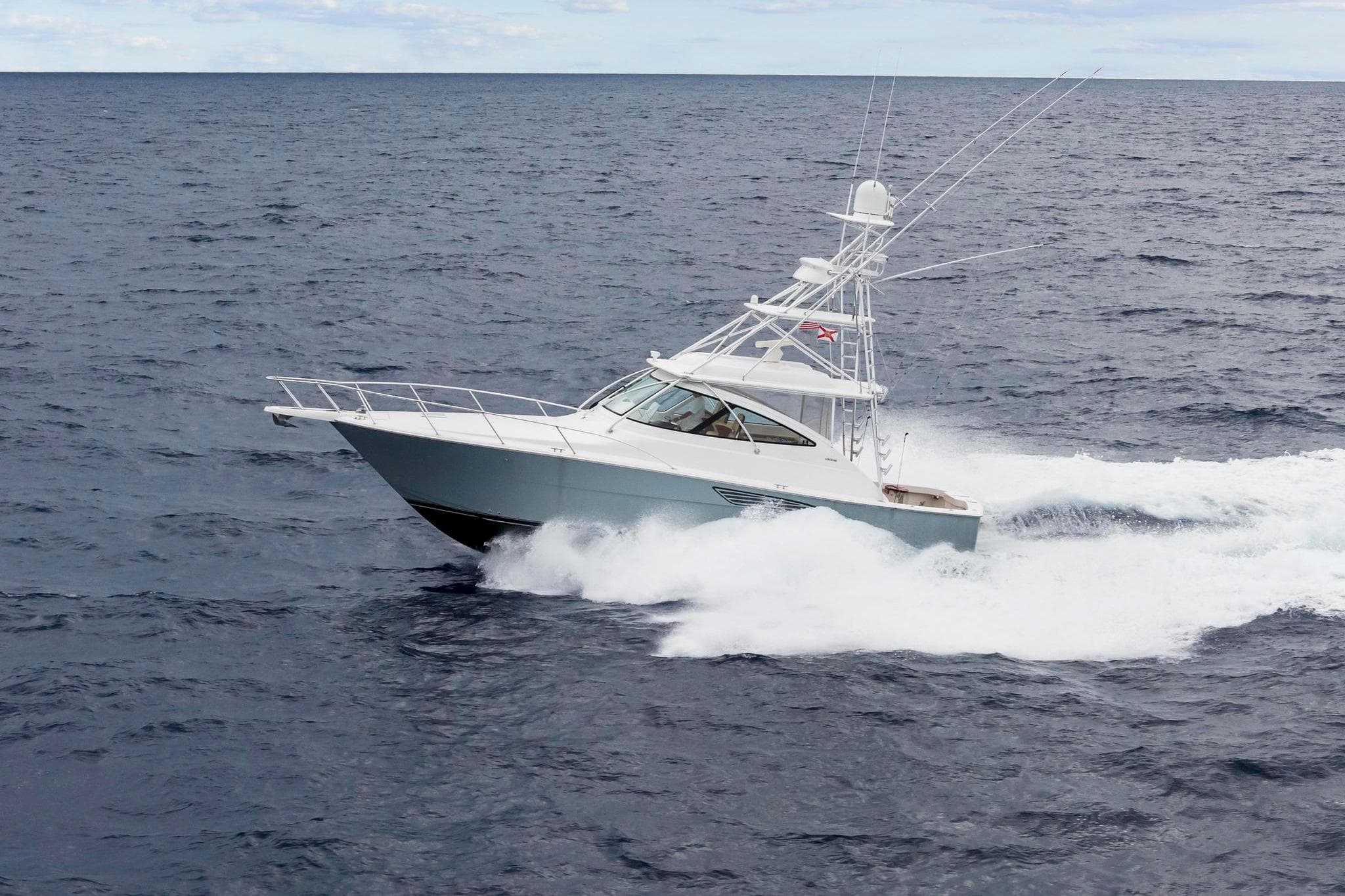 2018 Viking 44 Express yacht cruising on open ocean waters.