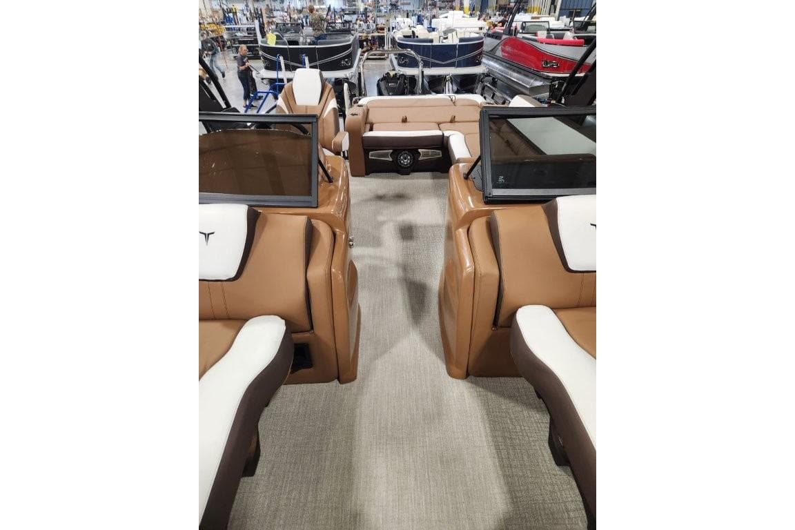 2026 Avalon 23 LSZ VRB Windshield boat interior with tan and white seating.