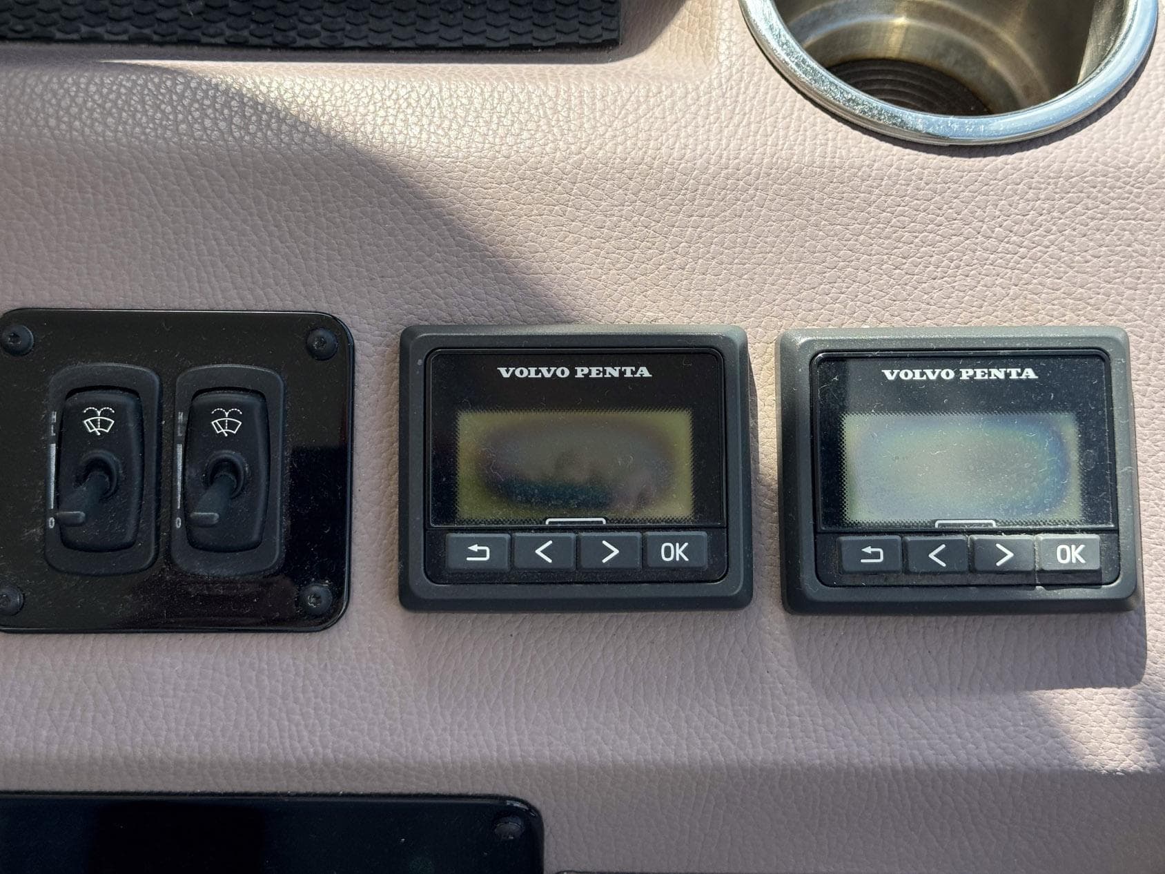 Control panel of a 2016 Regal 46 Sport Coupe with Volvo Penta displays.