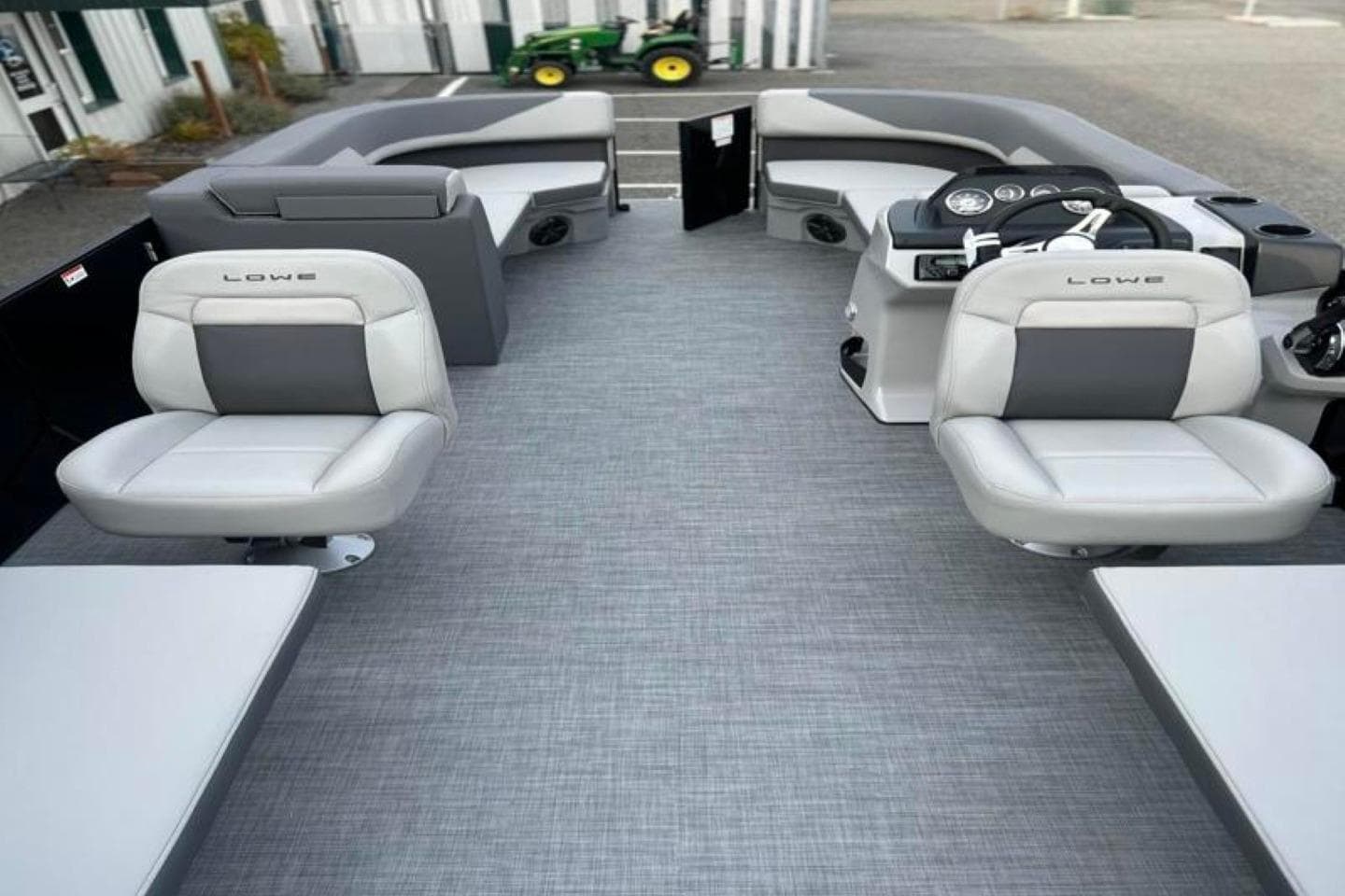 2026 Lowe LS 210 WT boat interior with modern seating and steering console.