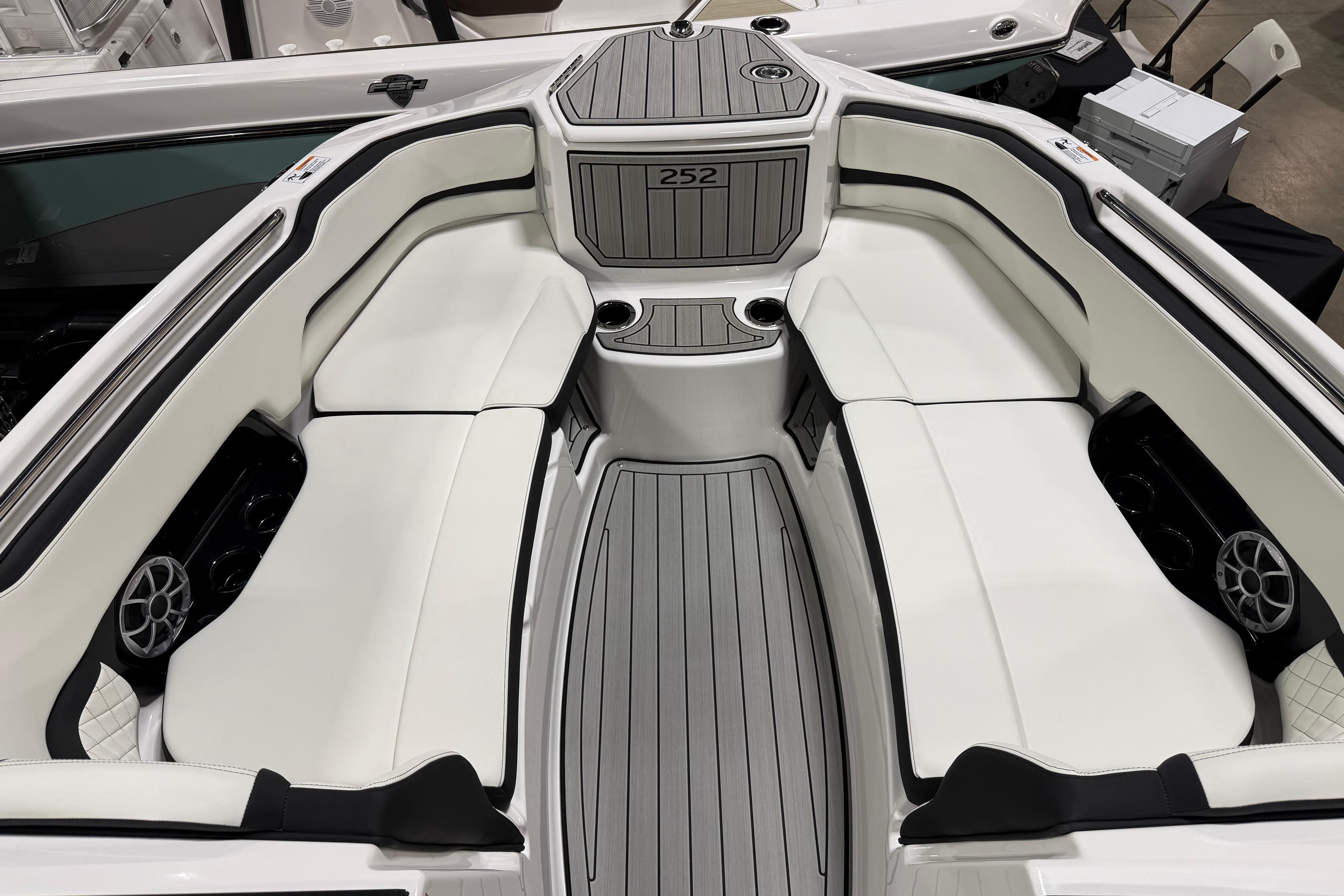 2026 Yamaha Boats 252S interior with white seating and sleek design.
