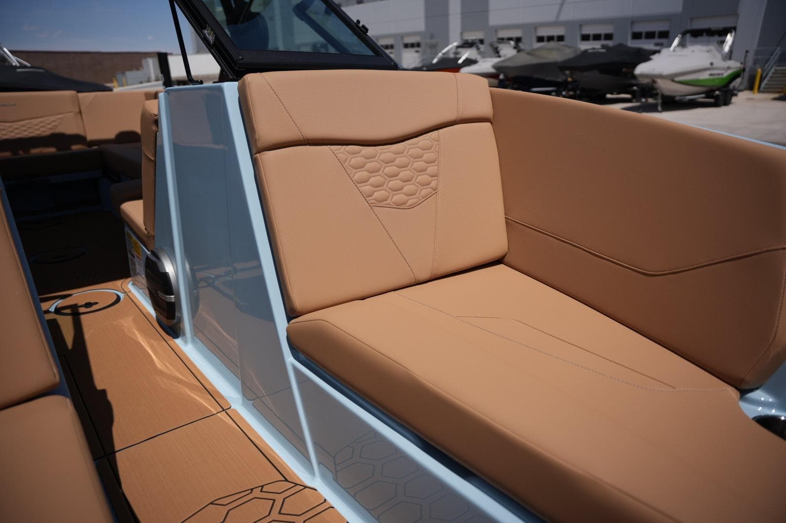 2026 MasterCraft NXT23 boat interior with tan leather seating and modern design.