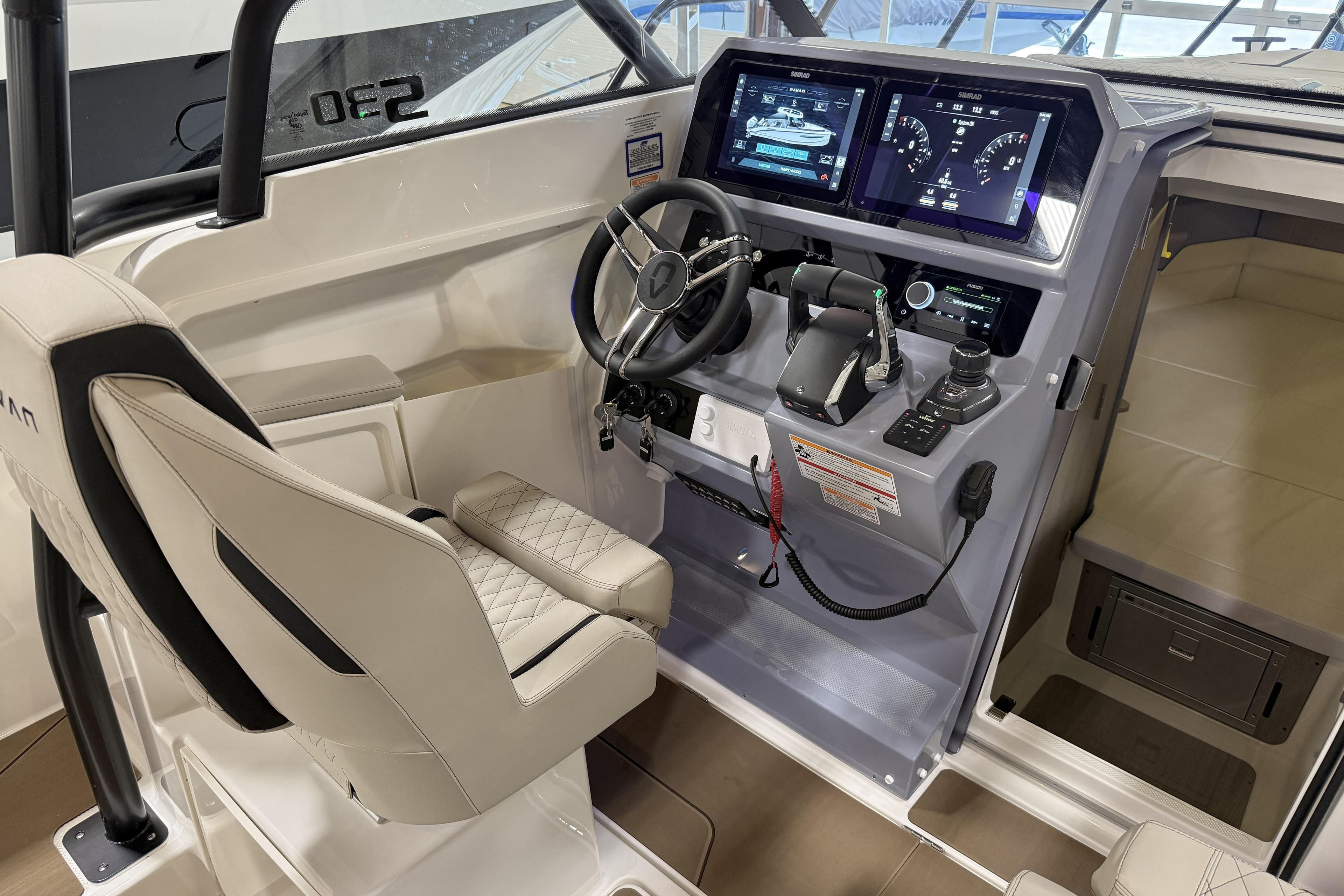 2026 Navan S30 boat cockpit with advanced navigation displays and ergonomic seating.