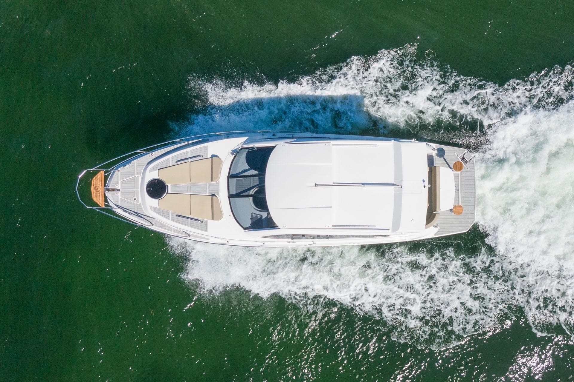 Aerial view of 2026 Hanover 375 yacht cruising on open water.