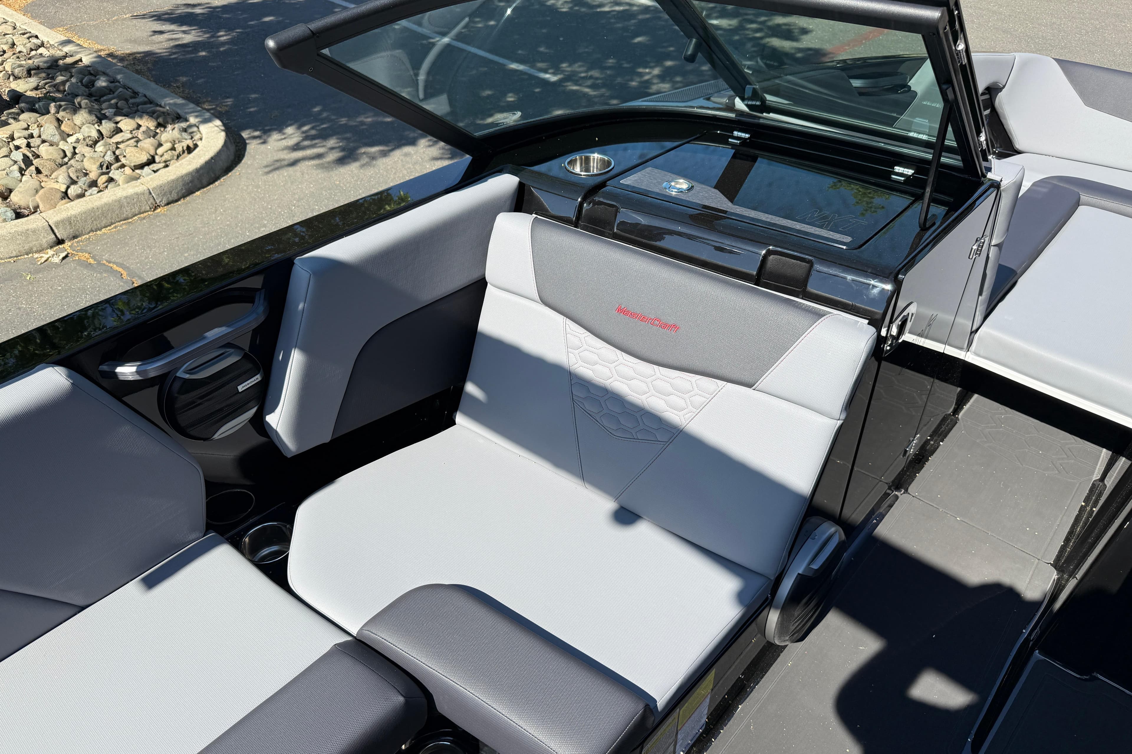 2026 MasterCraft NXT24 boat interior with gray seating and modern design.