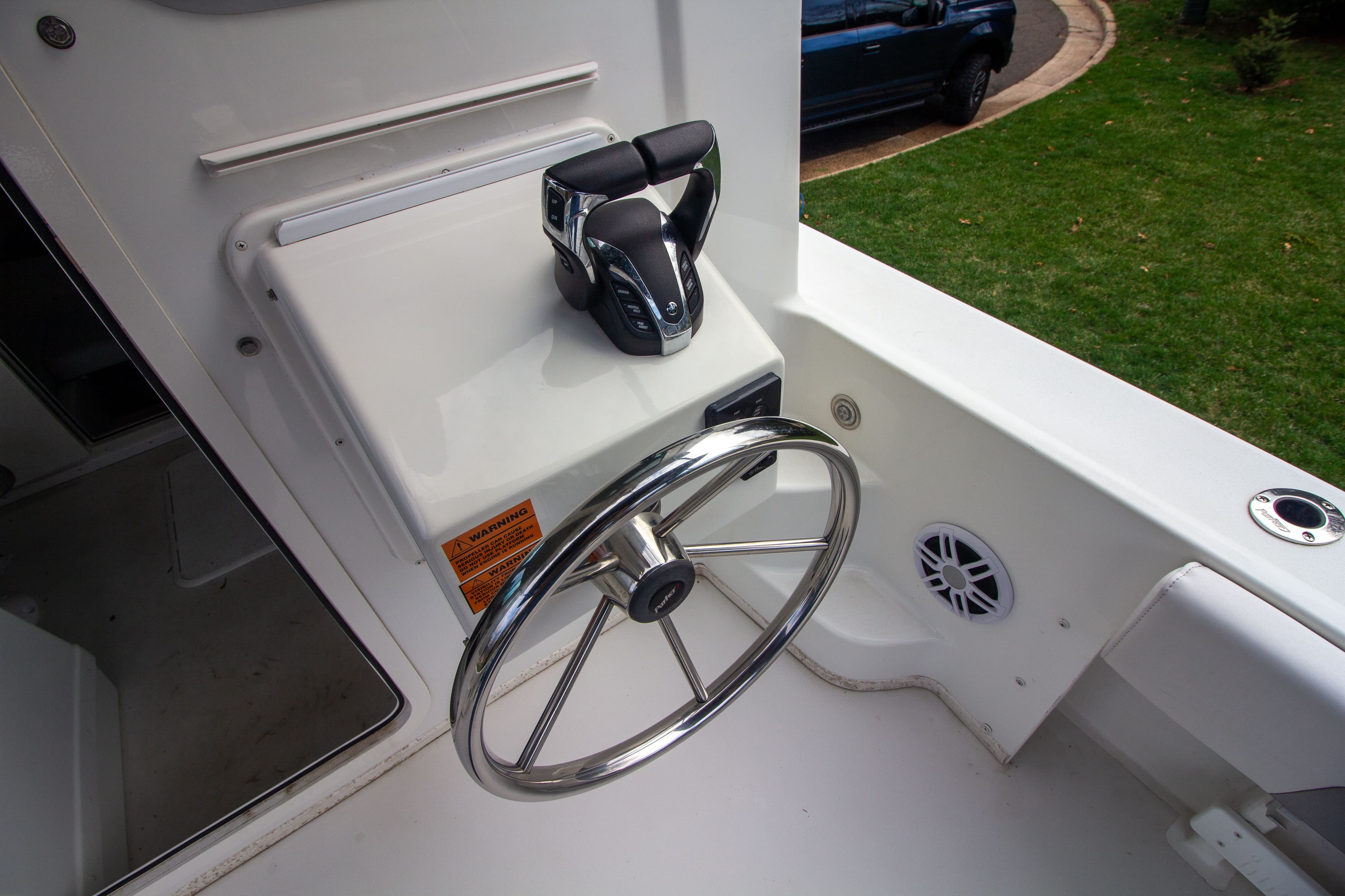 Helm of 2022 Parker 2520 XLD Sport Cabin with wheel and throttle control.