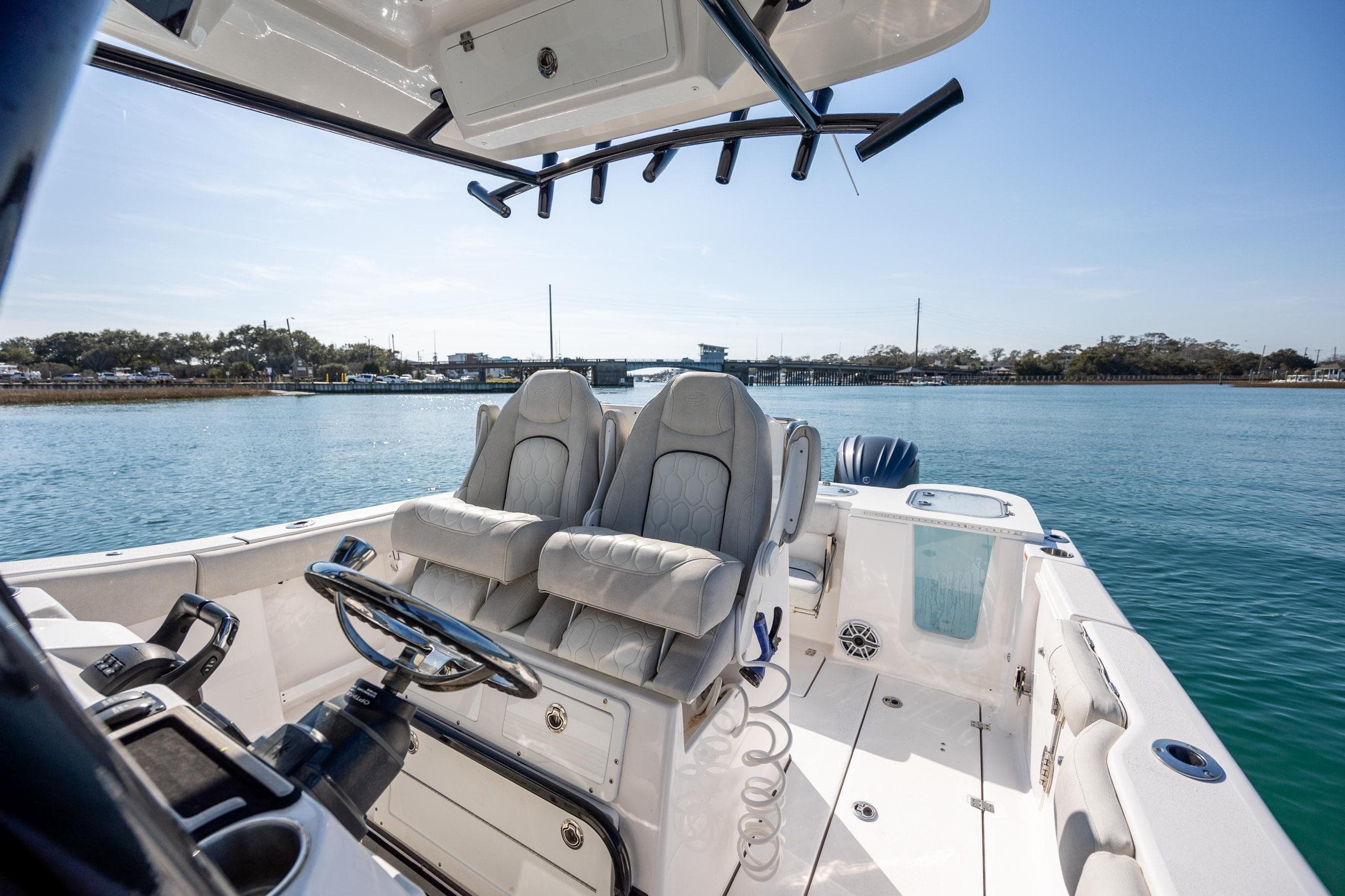 2023 Sea Fox 288 Commander boat interior with dual seats on a sunny day.
