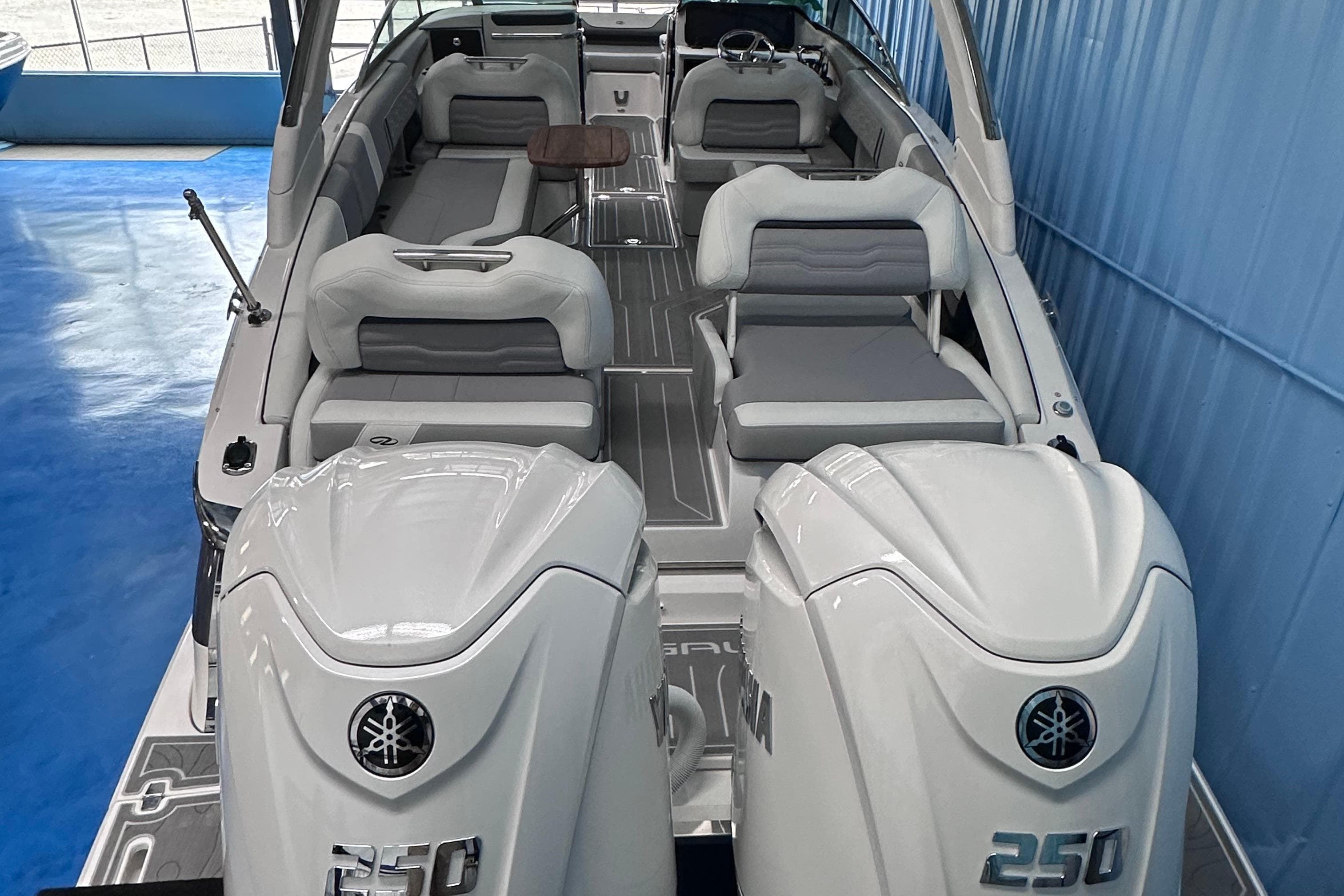 2026 Regal LX9 boat interior with dual Yamaha 250 engines, spacious seating, and modern design.