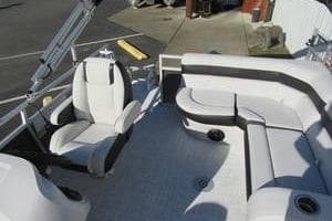 2025 South Bay 16 FC SE pontoon boat with white seating and spacious deck layout.
