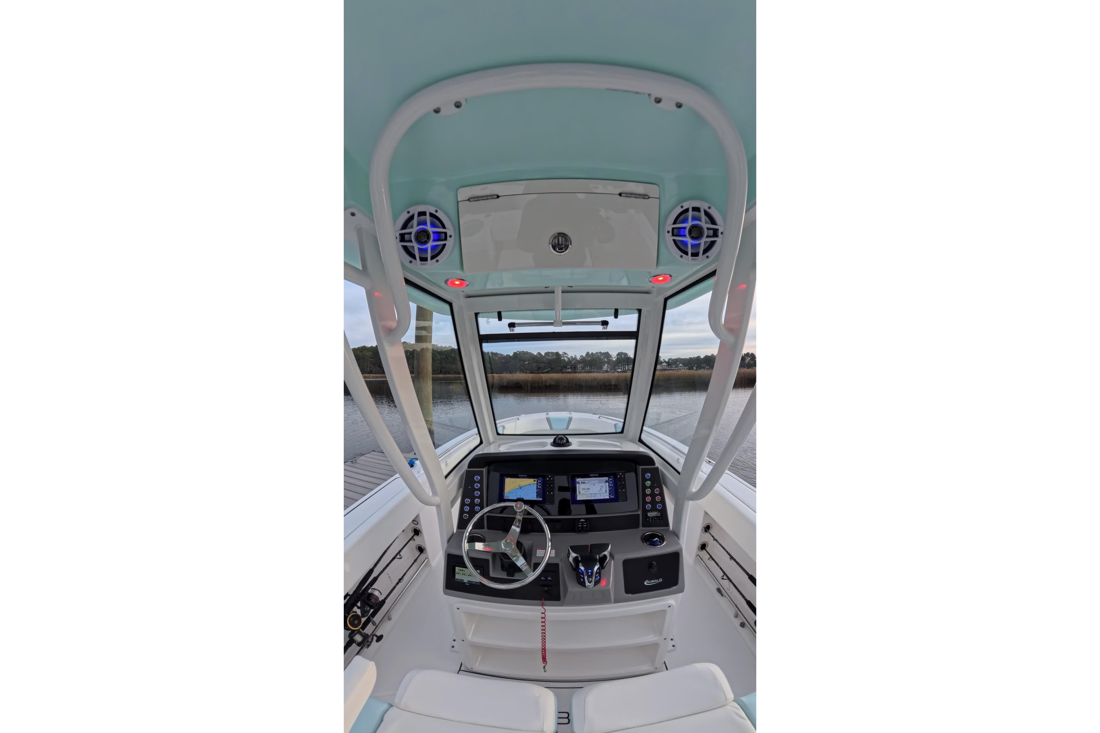 2025 Robalo R250 Center Console boat interior with advanced navigation system and steering wheel.