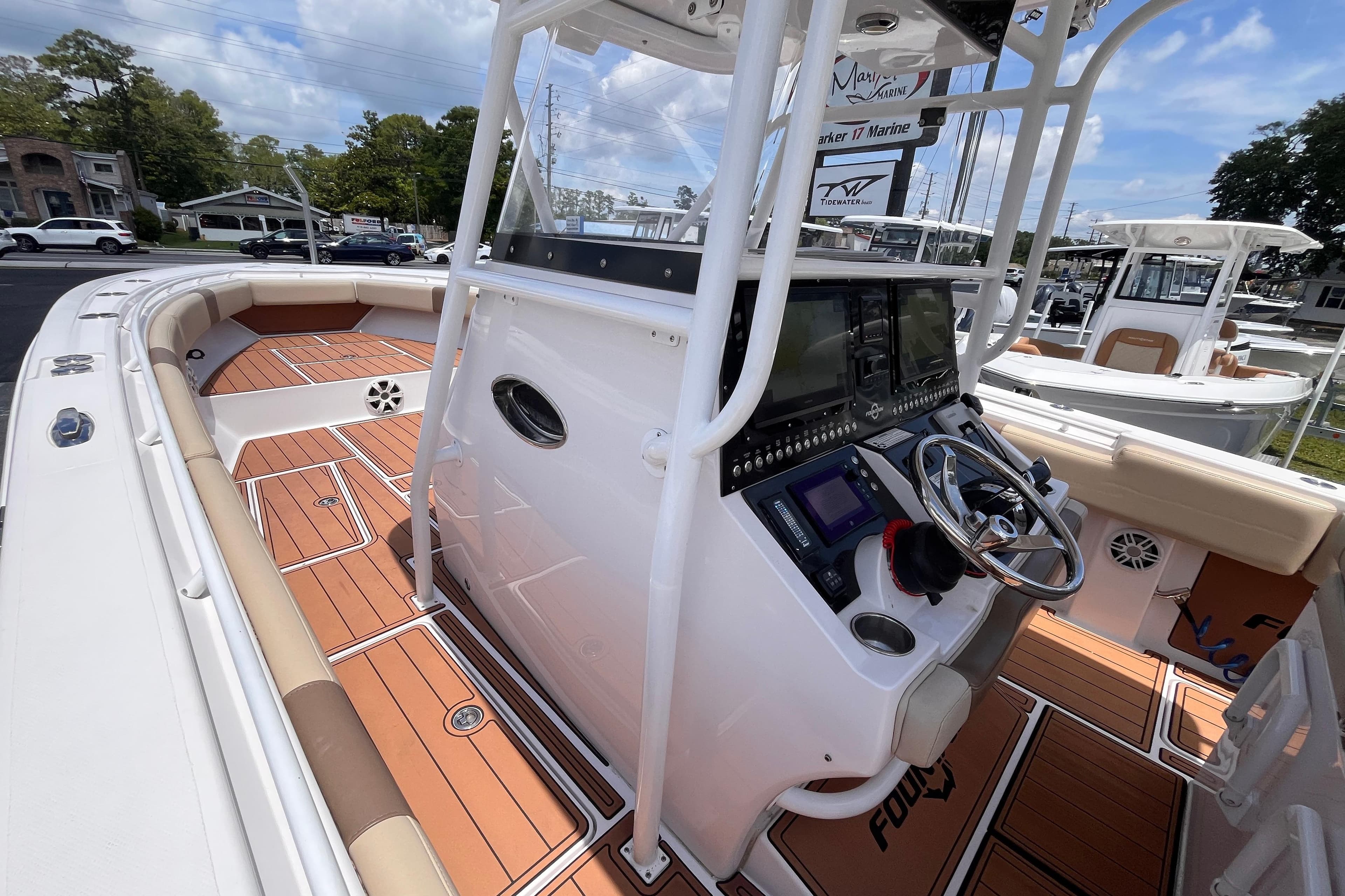2019 Fountain 38 Center Console boat with sleek design and modern dashboard.