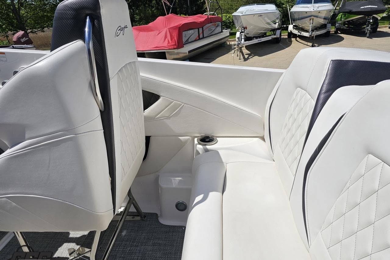 2019 Baja 27 Outlaw boat interior with white leather seating and diamond stitching.