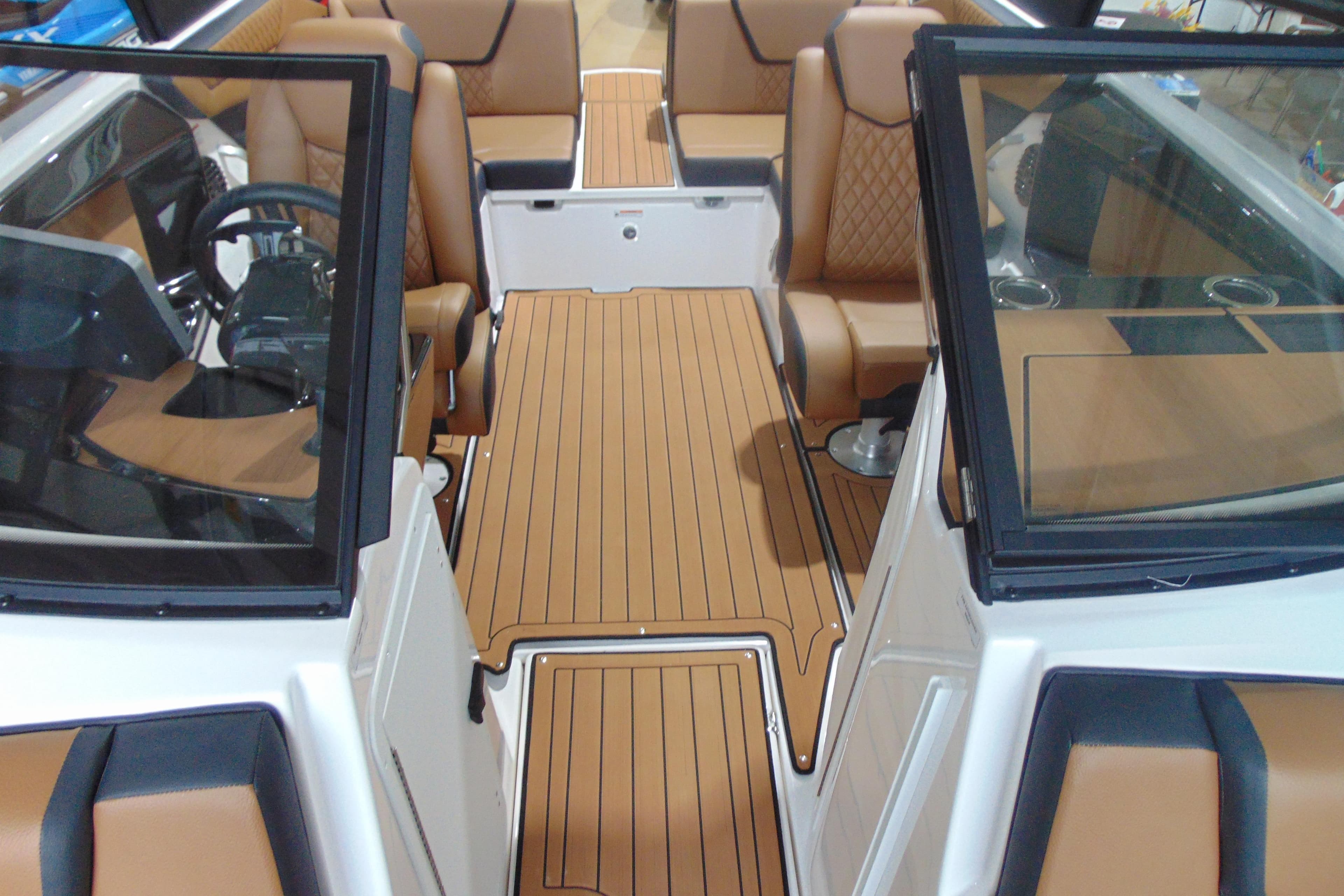 2026 Yamaha Boats 222SD interior with tan leather seats and sleek design.