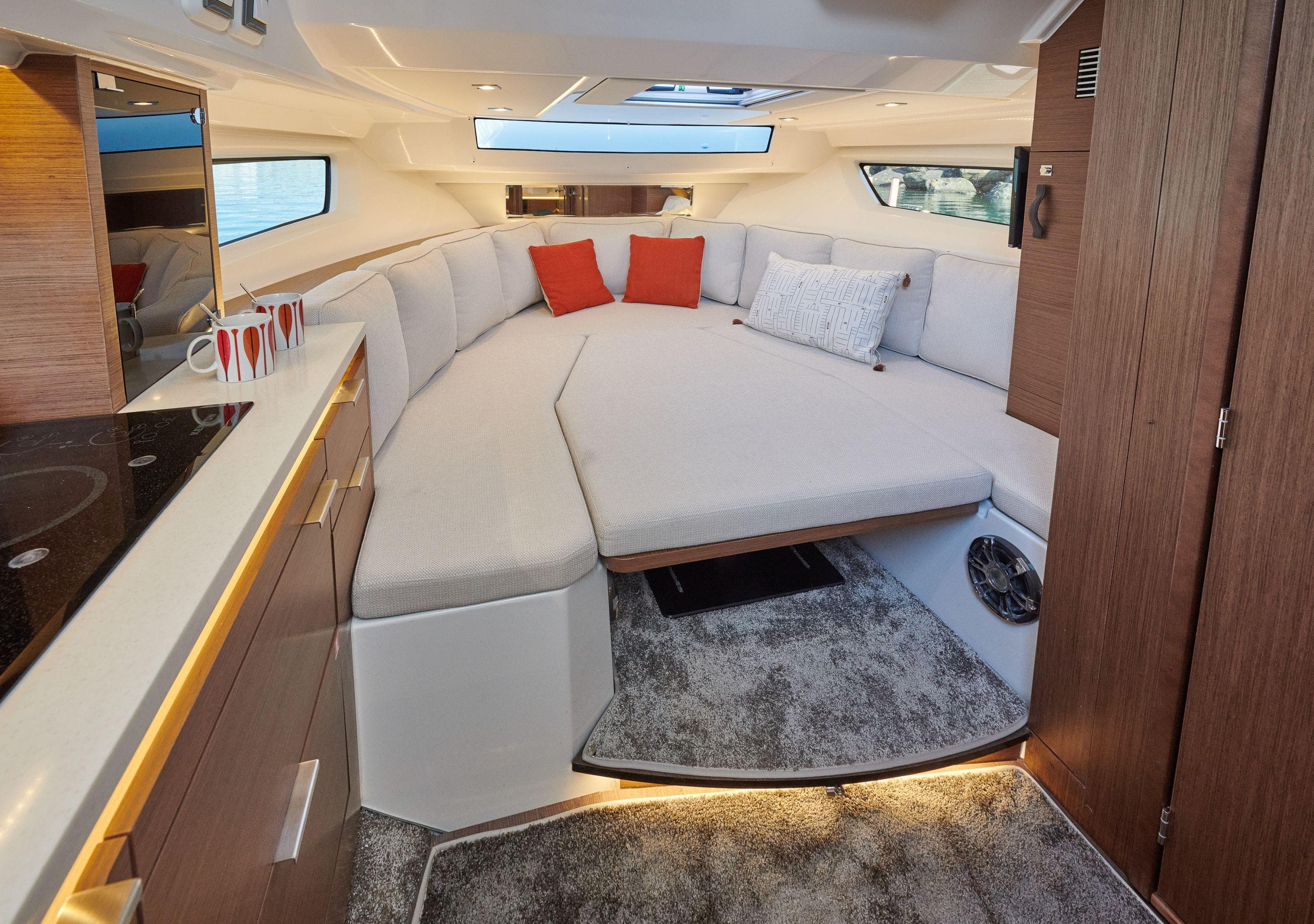 2025 Jeanneau Leader 10.5 WA Series 2 interior with cozy seating and modern design.