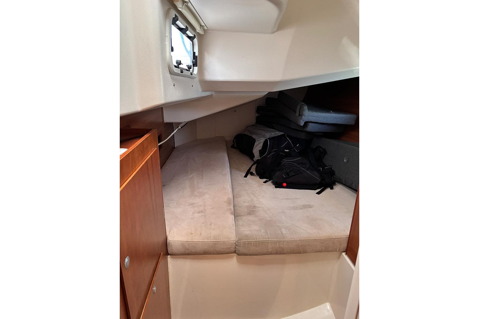 2014 Hanse 445 yacht cabin interior with bed and storage space.