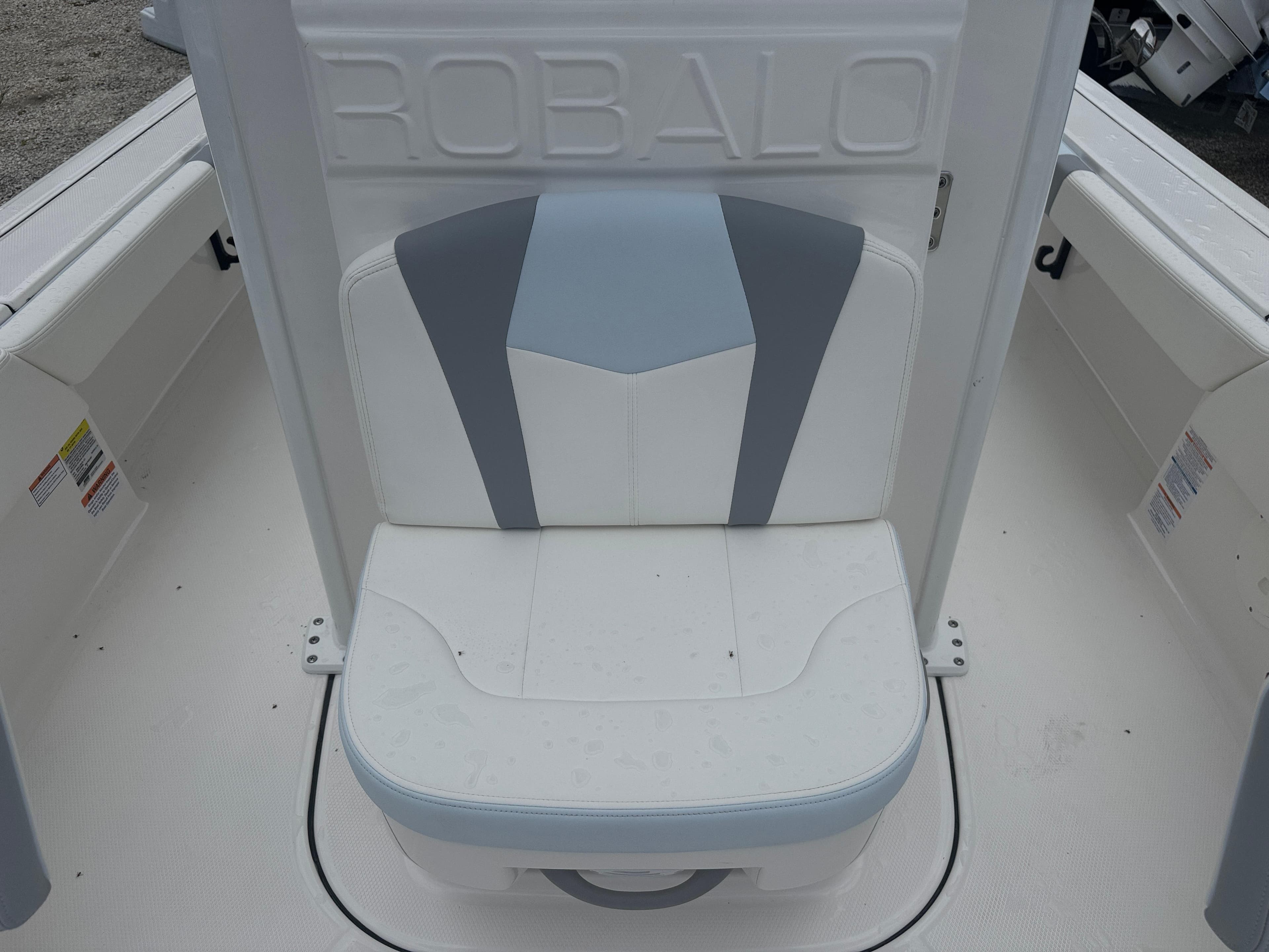 2025 Robalo 246 Cayman boat seat with gray and white upholstery.