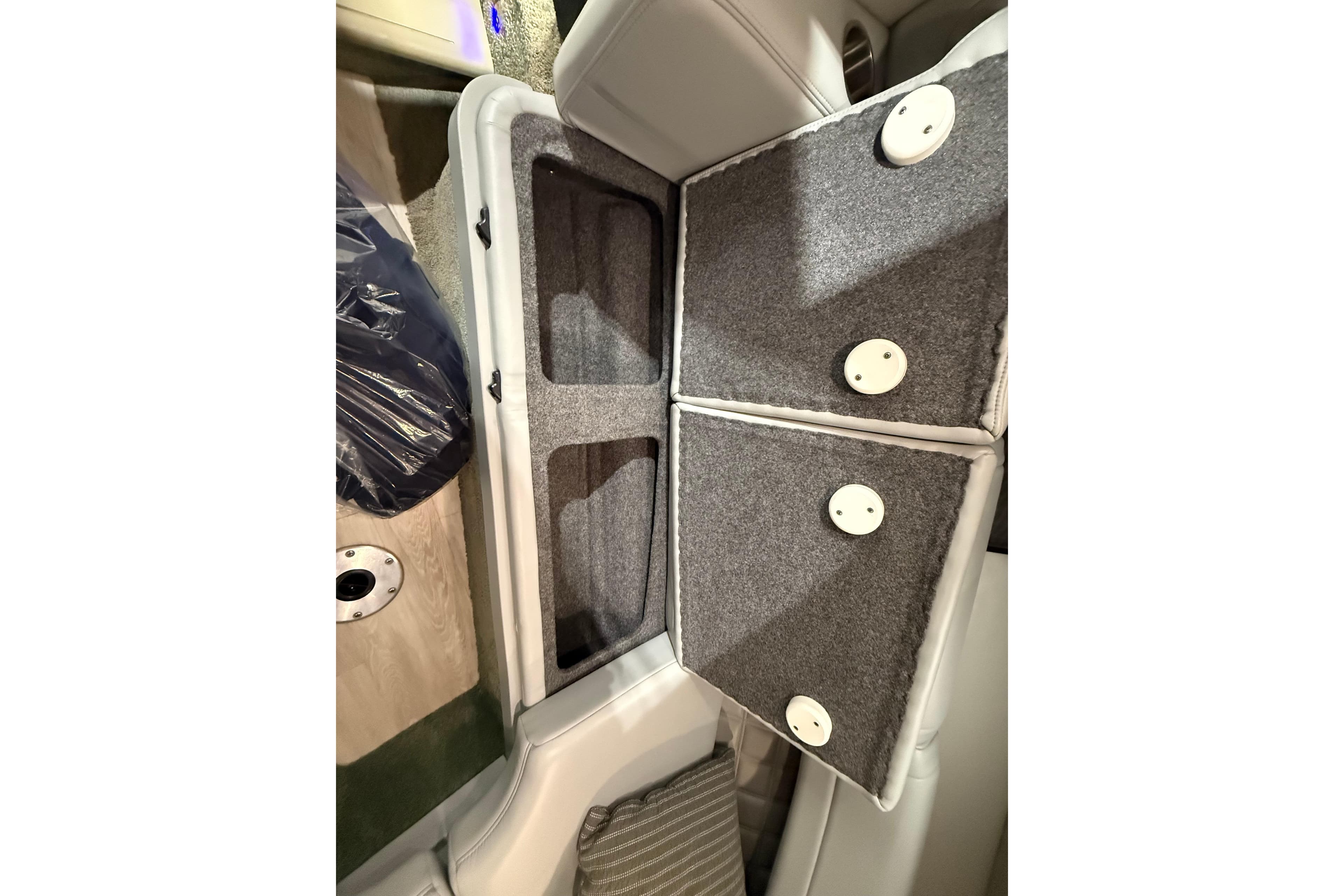 Interior storage compartments of a 2018 Formula 270 Sun Sport boat.