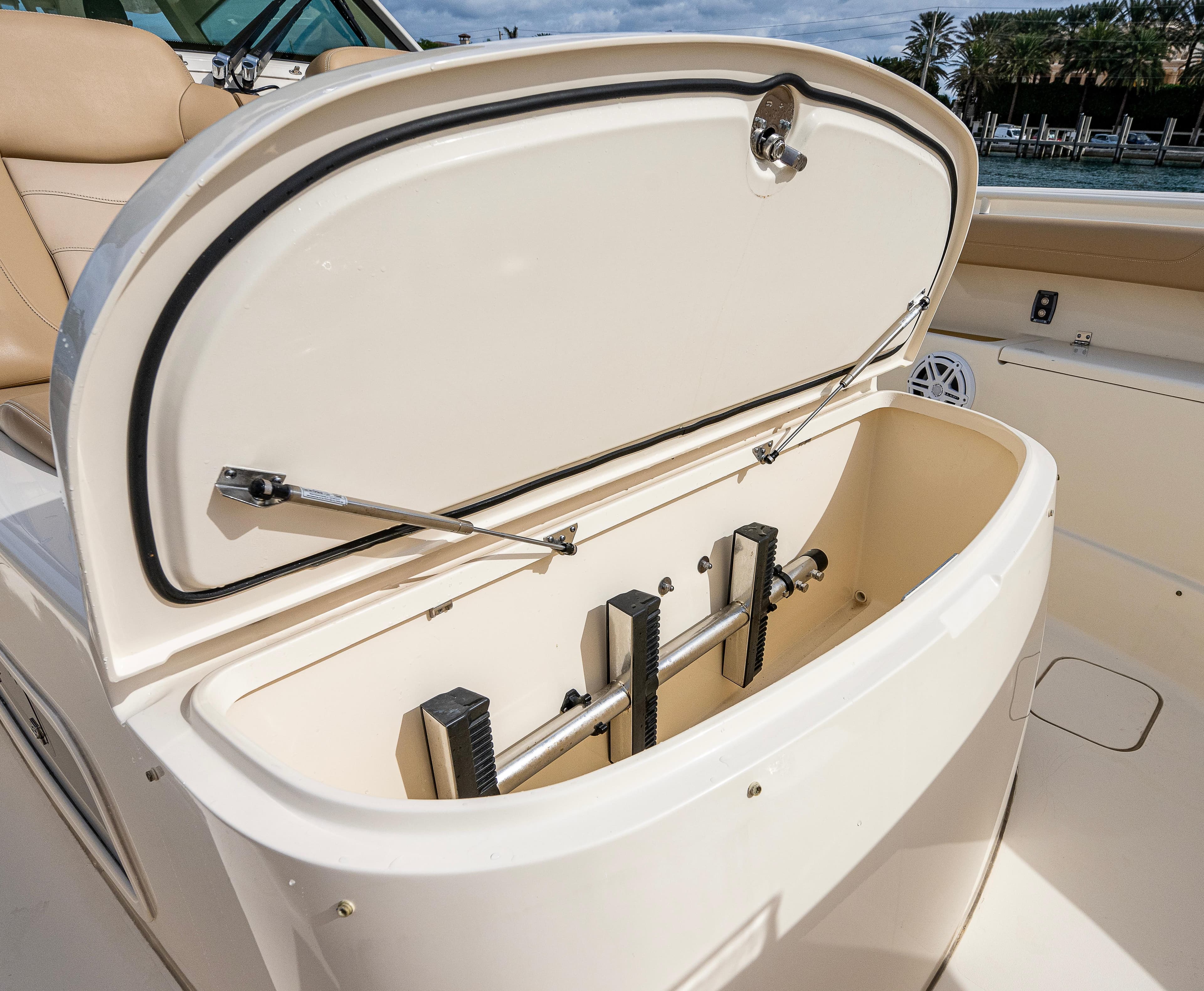 2019 Scout 420 LXF boat storage compartment open, showcasing interior features.