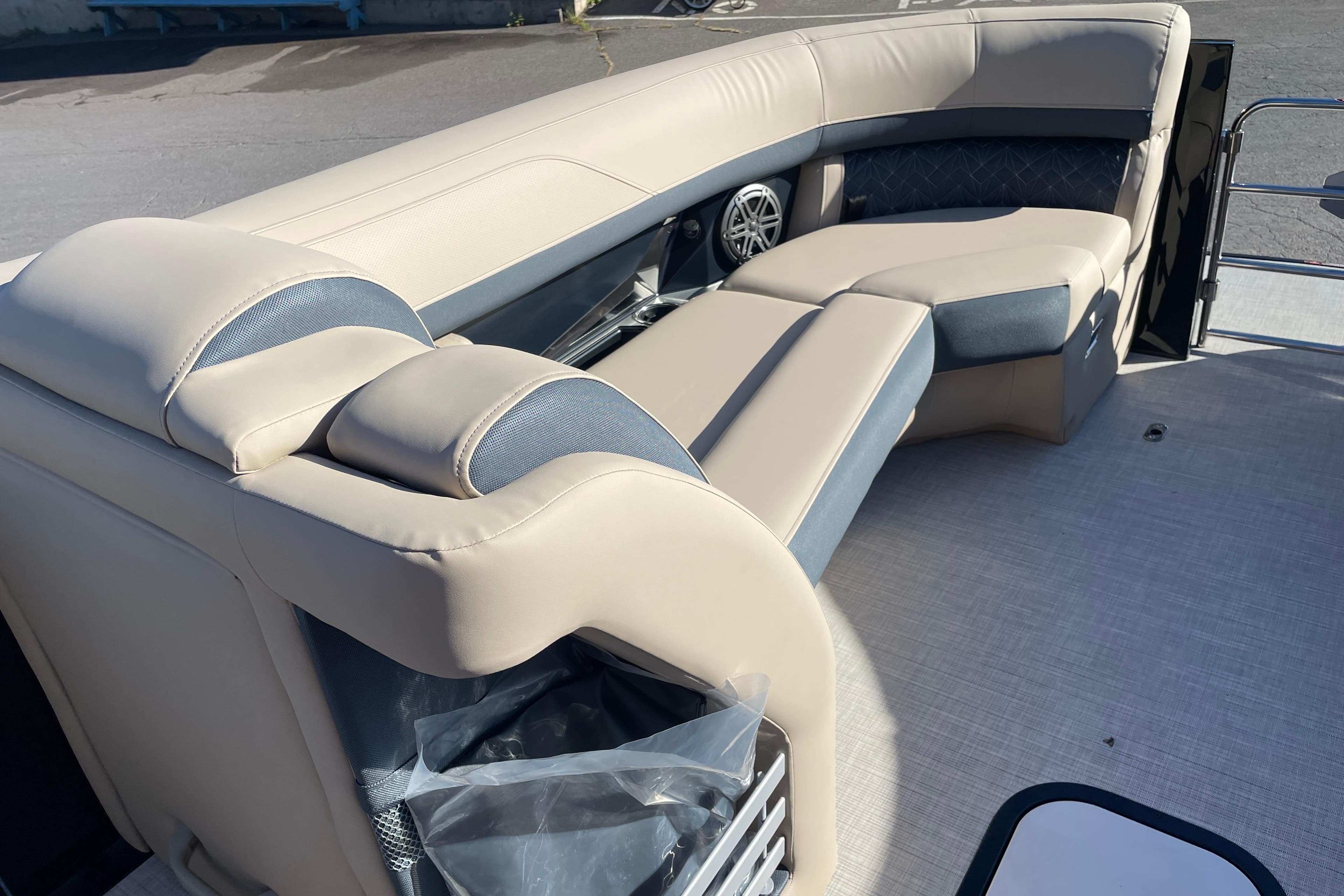 Luxurious seating on 2026 Harris Grand Mariner 230 SL pontoon boat, featuring elegant upholstery.