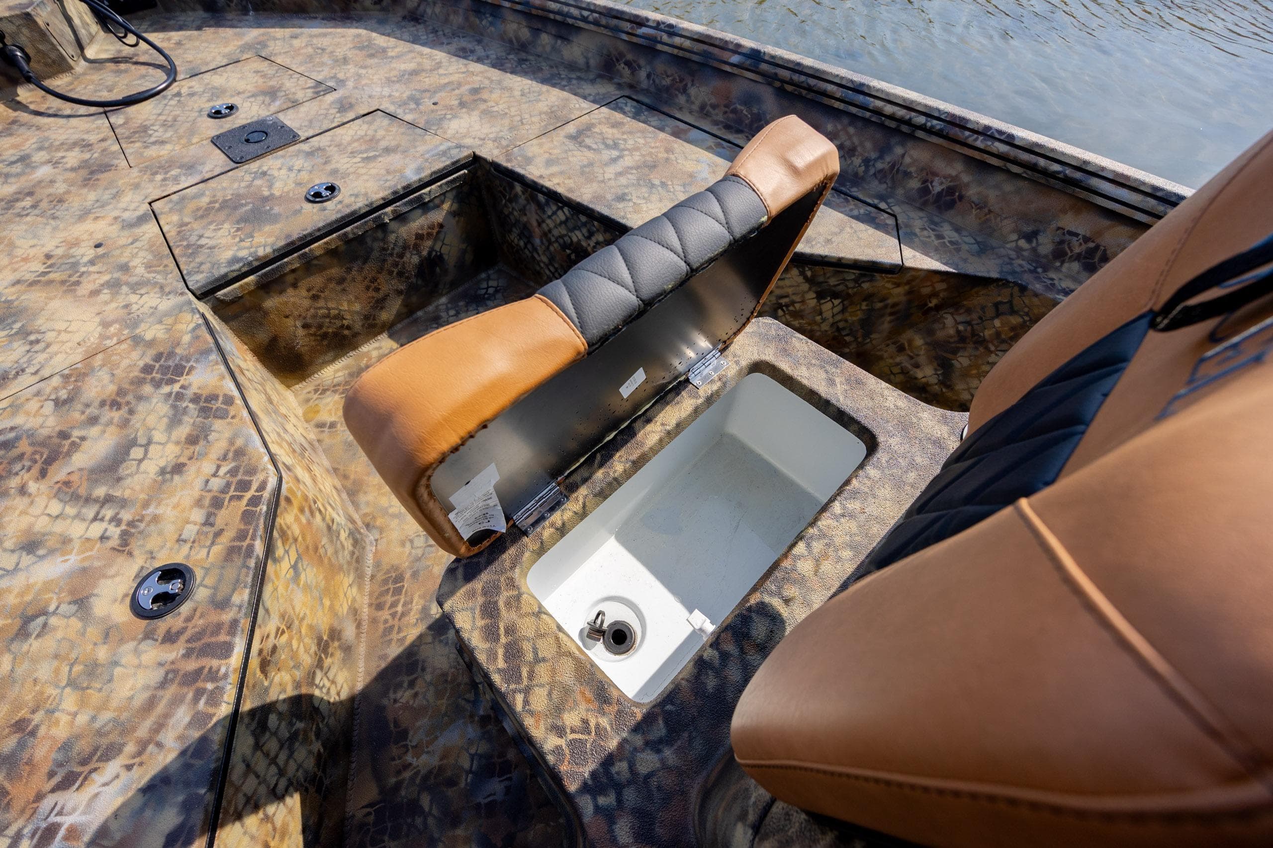 2026 Excel 203 Bay Pro Elite boat interior with open storage compartment.