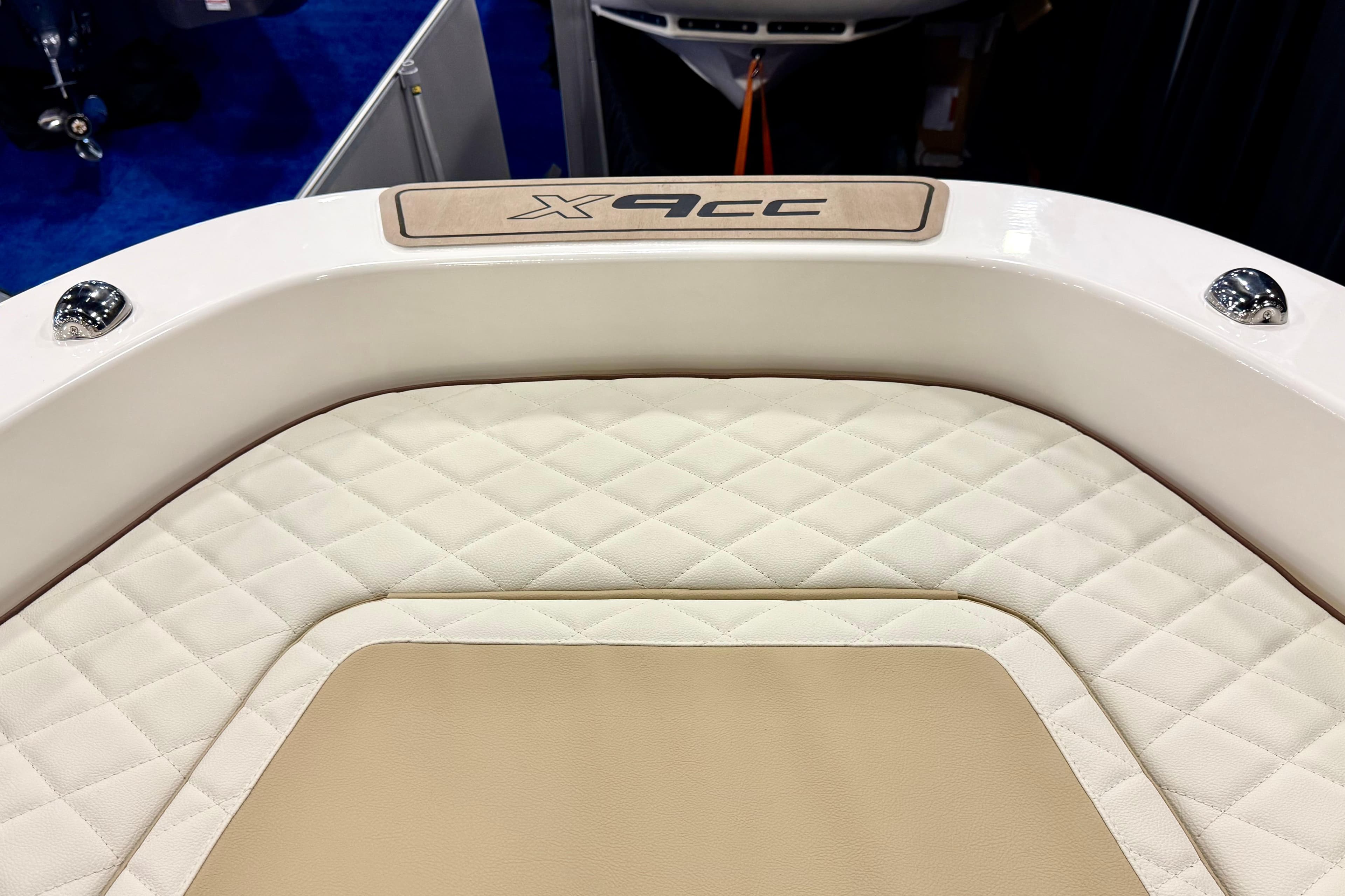 Luxurious Zodiac X9CC 2026 boat interior with quilted seating and sleek design.