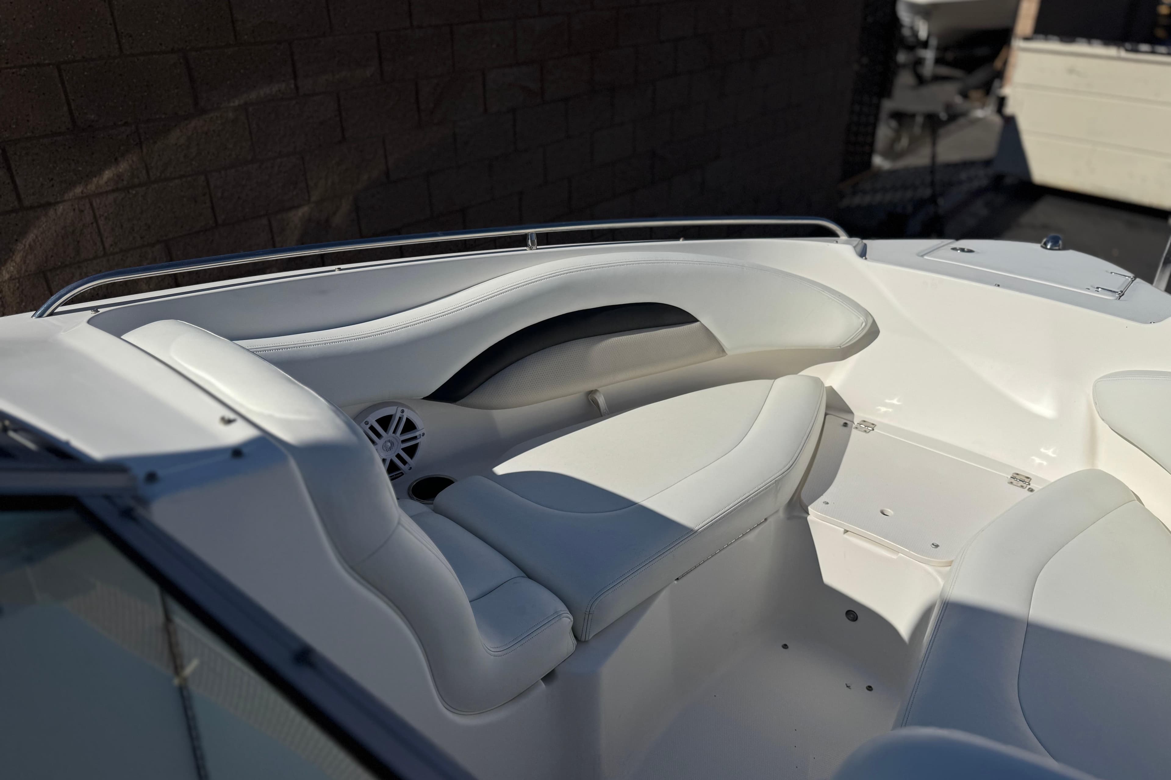 Interior view of 2011 Chaparral 267 SSX boat with white seating.