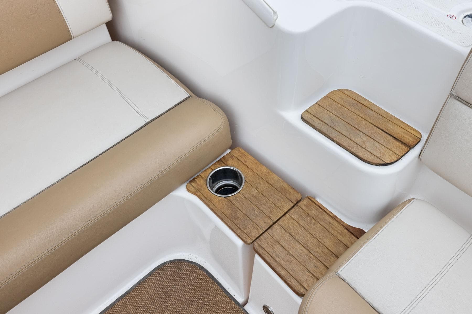 Luxurious seating and teak accents on 2012 Tiara Yachts 3100 Coronet.