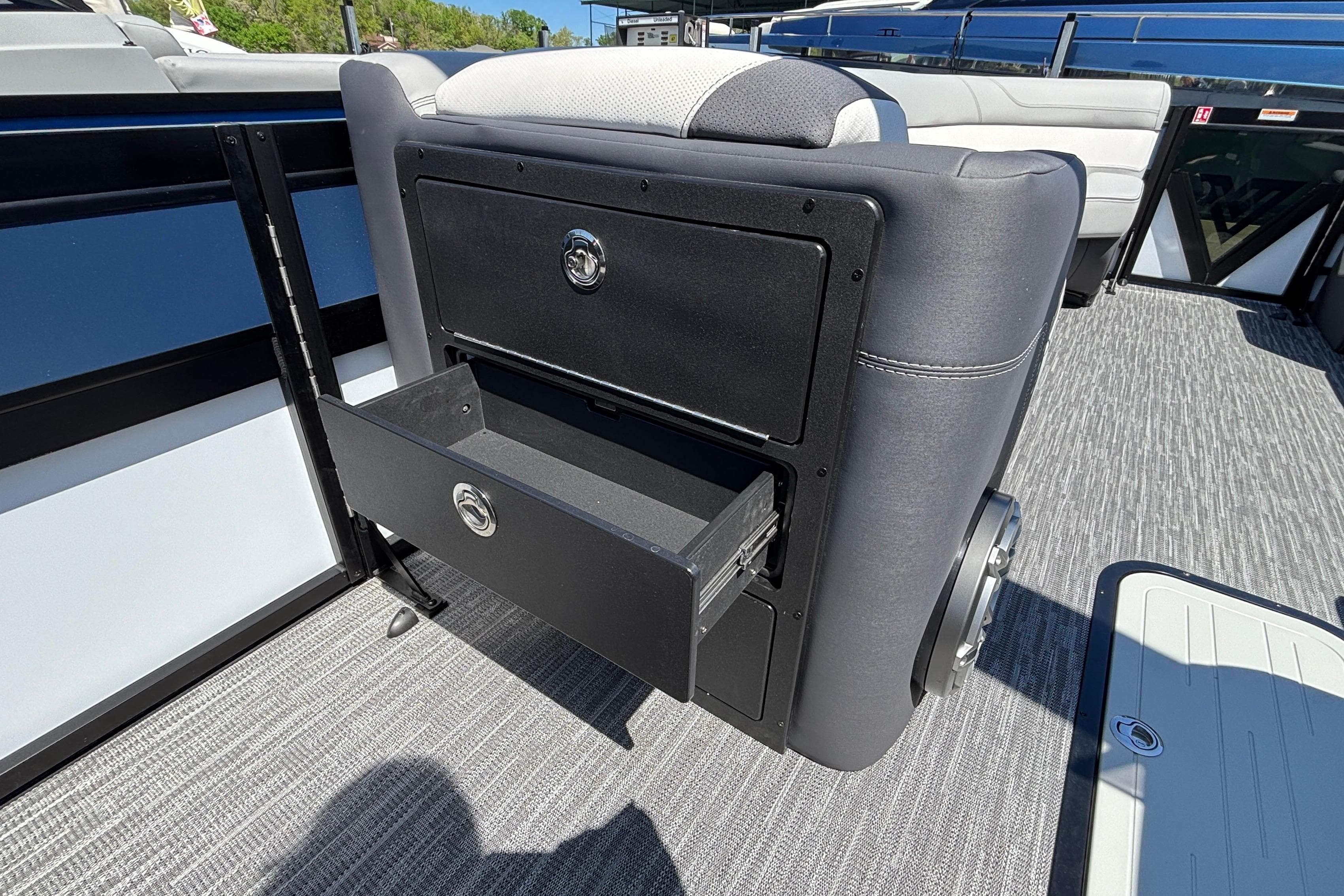 Interior of 2026 Viaggio D26U boat with open storage compartment and modern seating.